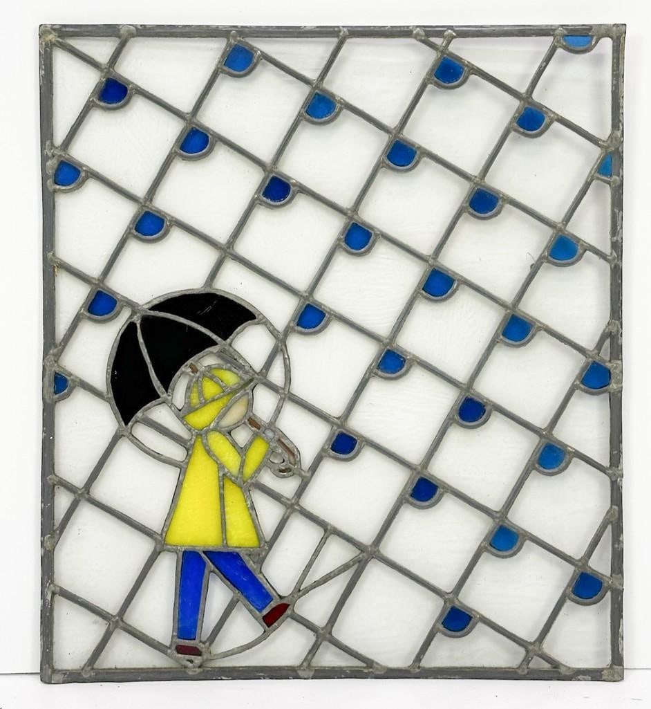 Vintage Leaded Stained Glass Rainy Day Child with Umbrella: Charming stained glass piece depicting child in rain. Maker unknown. Condition: Excellent condition. Dimensions: 21 in H x 18.5 in W. Weighs 7.5 lbs.