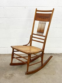 Antique Rocking Chair with Carved Floral Detail