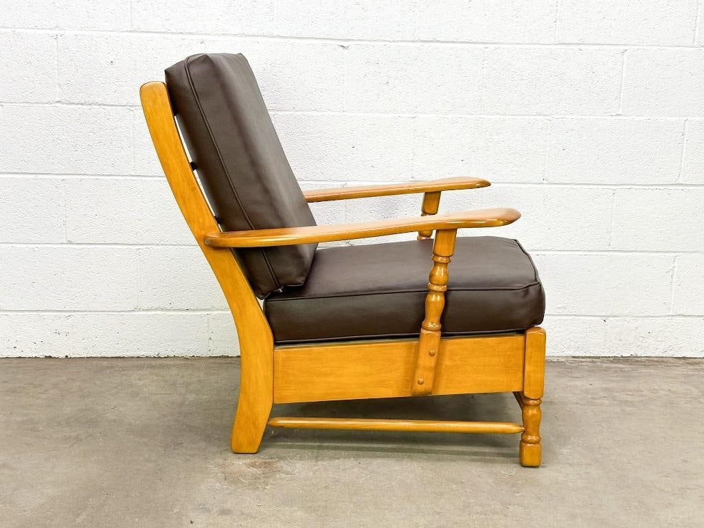 Vintage Monterey Style Western Maple Wood & Leather Lounge Chair: Monterey style with mocha brown leather upholstery. Condition: Excellent condition. Dimensions: 36 in. H x 29 in W x 31 in D.