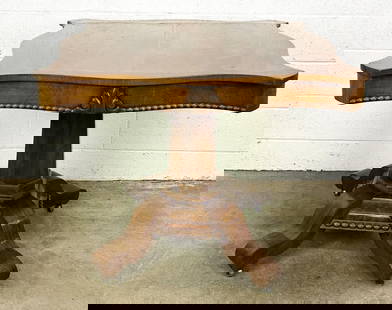 Antique Empire Style Pedestal Table W/ Casters: Wonderful veneered wood grain table top. Accented edges with carved detail. On casters.  Condition: Some minor surface wear, scratches and scuffs throughout. Some cracks on two corners of veneer of ta