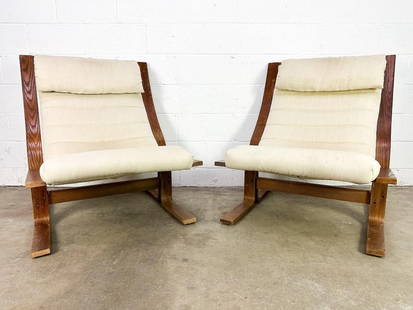 Pair 1970s Midcentury Modern Bentwood Lounge Chairs: Removable pillow with Velcro. Bentwood frame. Off white upholstery. “Jun 1979&rdquo; stamp on bottom.  Condition: Good. Some discoloration on fabric. Some fading on wood.  Dimensions: Chairs are app