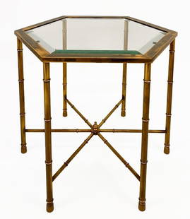 Vintage Hexagonal Glass and Brass Side Table: Glass tabletop with brass legs and supports.  Condition: Good condition. Light wear on glass surface. Tarnishing to metal.  Dimensions: Approximately 17 in H x 20.25 in W x 17.5 in D. Total weight is