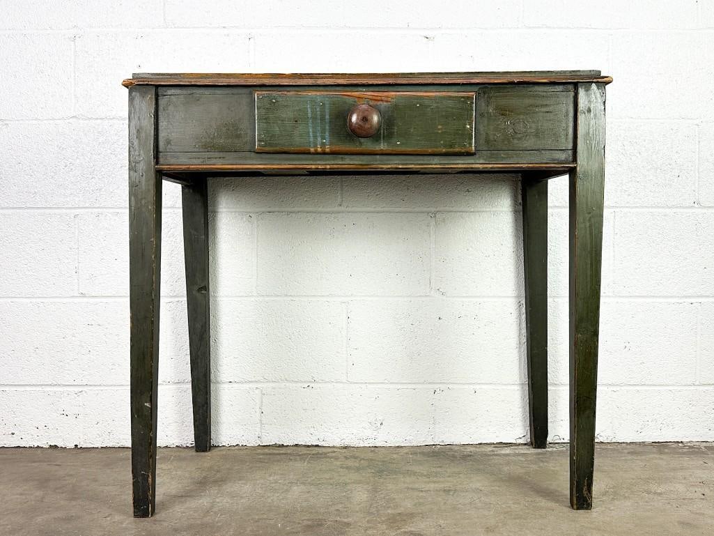 Antique Green Painted Primitive Table w/ Drawer Made from a Cadbury's Chocolate Crate: Green console table w/ drawer. Nice patina throughout. Dovetail joints. Made from Cadbury's Cocoa wood crate, visible on underside. "Cadbury's cocoa is absolutely pure" Condition: Some surface wear,