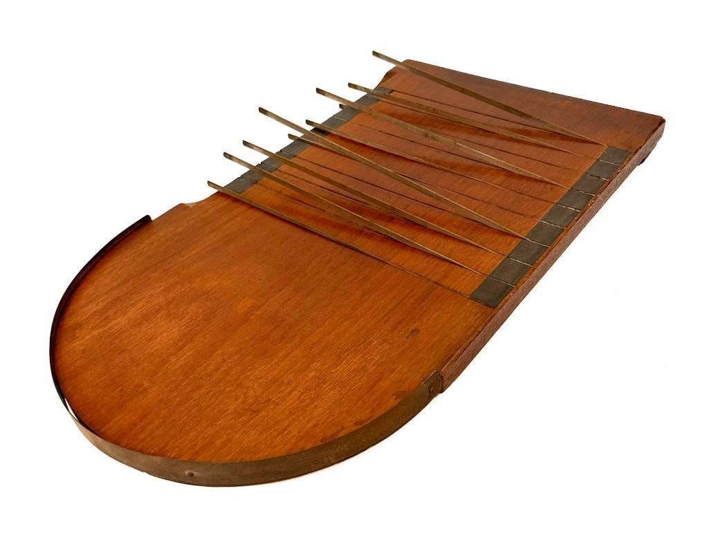 Antique Shove ha'penny Board Game: Pub board game from England. Condition: Some minor surface wear throughout. Some of the black wood tabs are not flush. Dimensions: Game is approx. 26.5 in H x 14.75 in W x 2 in D. Weighs 7.8 lbs