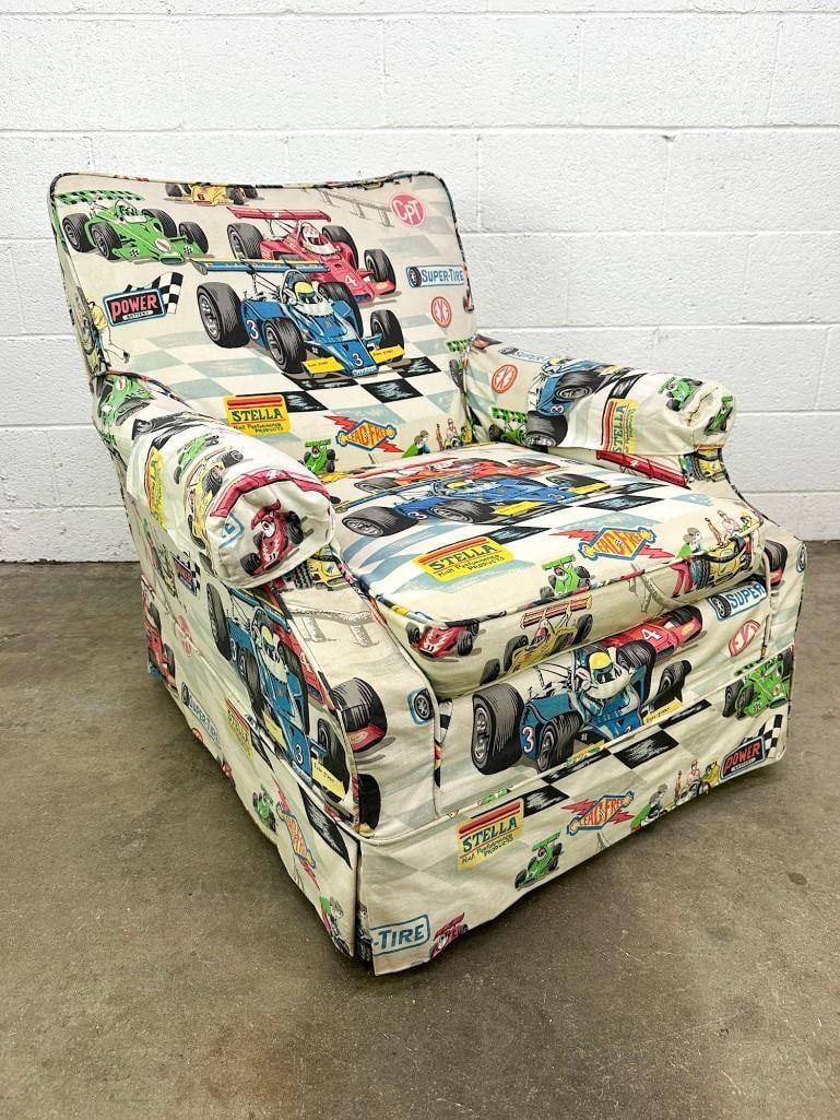 Vintage Armchair w/ Matchbox Hot Wheels Race Car Style Upholstery Cover: Unique chair cover. Design displays race cars, logos and pit stop crew. Two armrest covers. Condition: Some minor wear from use. Some discoloration on upholstery from sun exposure. Dimensions: Chair