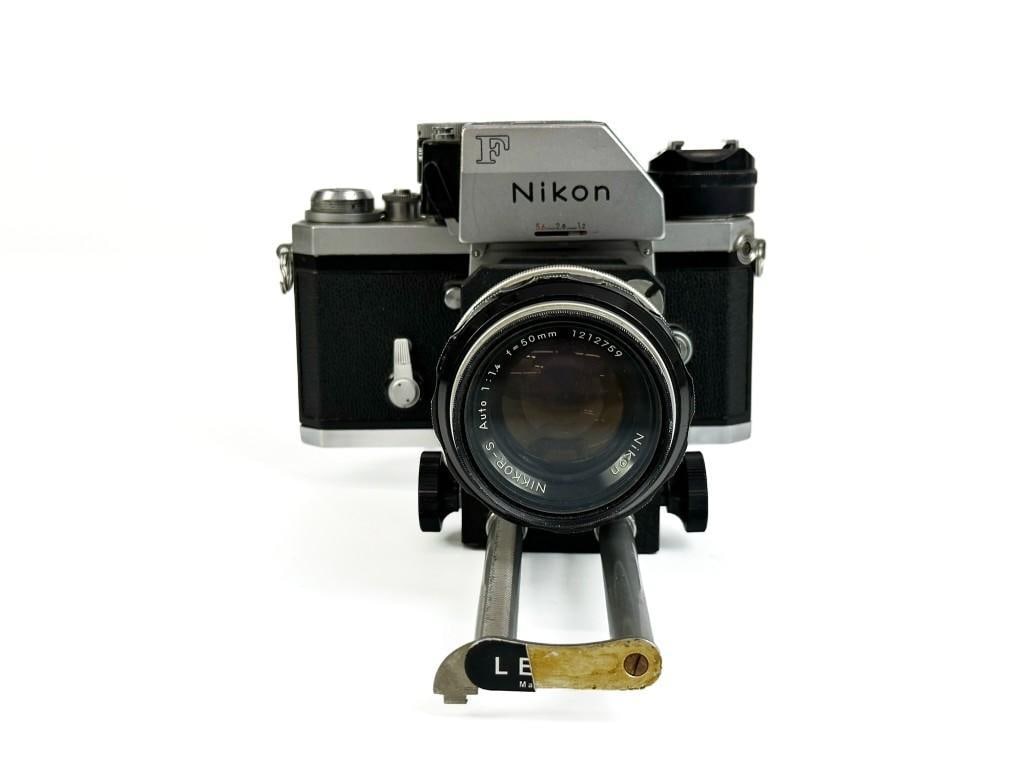 Nikon F 35mm Film Camera with Bellows Attachment: Includes Nikkor-S Auto 50mm 1:1.4 lens. Shutter fires. Some surface wear throughout.