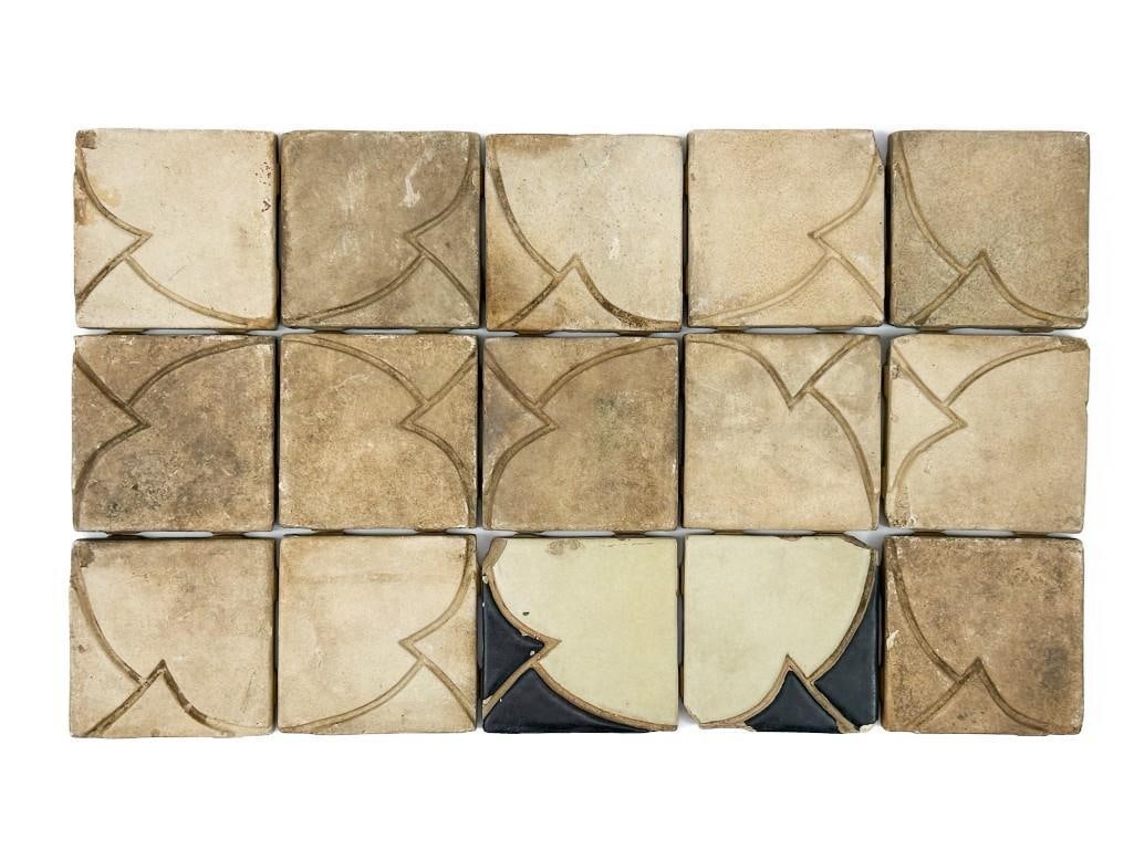 Lot of 15 Batchelder Art Deco Square Tiles: 15 tiles with floral/clover pattern. Two are glazed and the rest are unglazed. Stamped on back. Condition: Some chips. Some surface wear. Dimensions: 3 in H x 3 in W x 0.5 in D. Combined