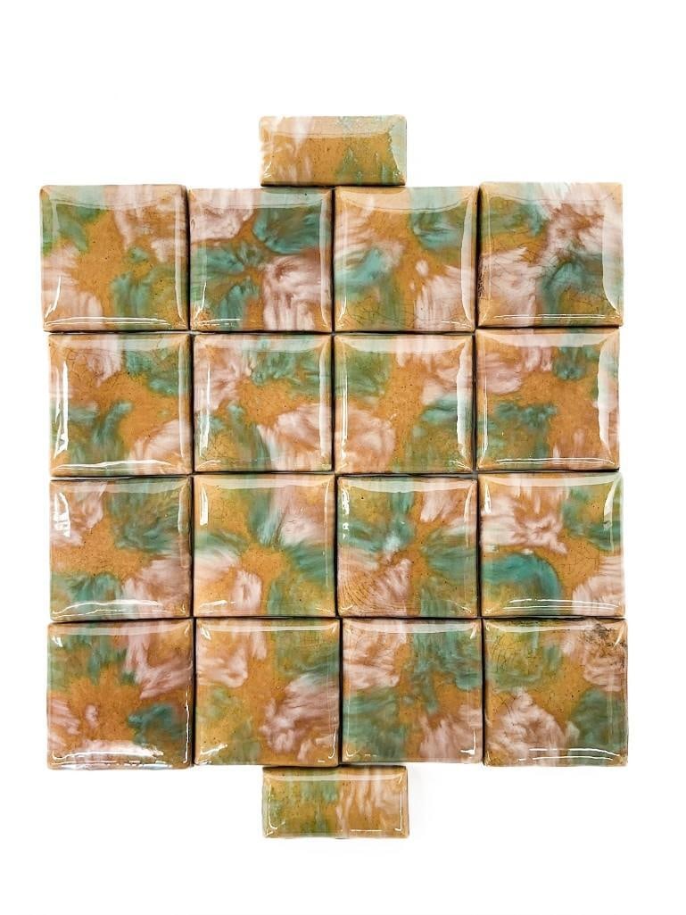 Lot of 18 Antique Malibu Potteries Ceramic Pillow Tiles: Ceramic tiles are a glossy camel color with green and pink oxides. Mix of square and rectangular tiles. Condition: Overall good condition. Some chips. Dimensions: Rectangular tile is approximately 3
