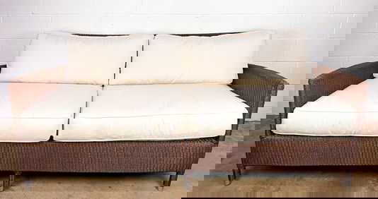 Janus et Cie Wicker Outdoor Sofa with Cream Cushions