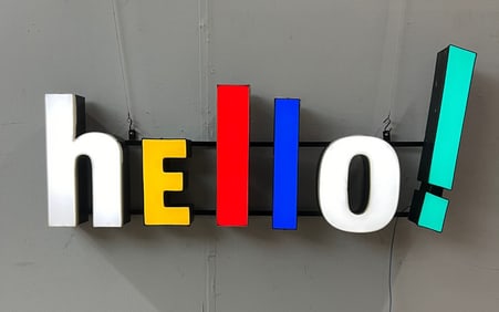 HELLO! Vintage Channel Letter Sign Assembled from Various Components