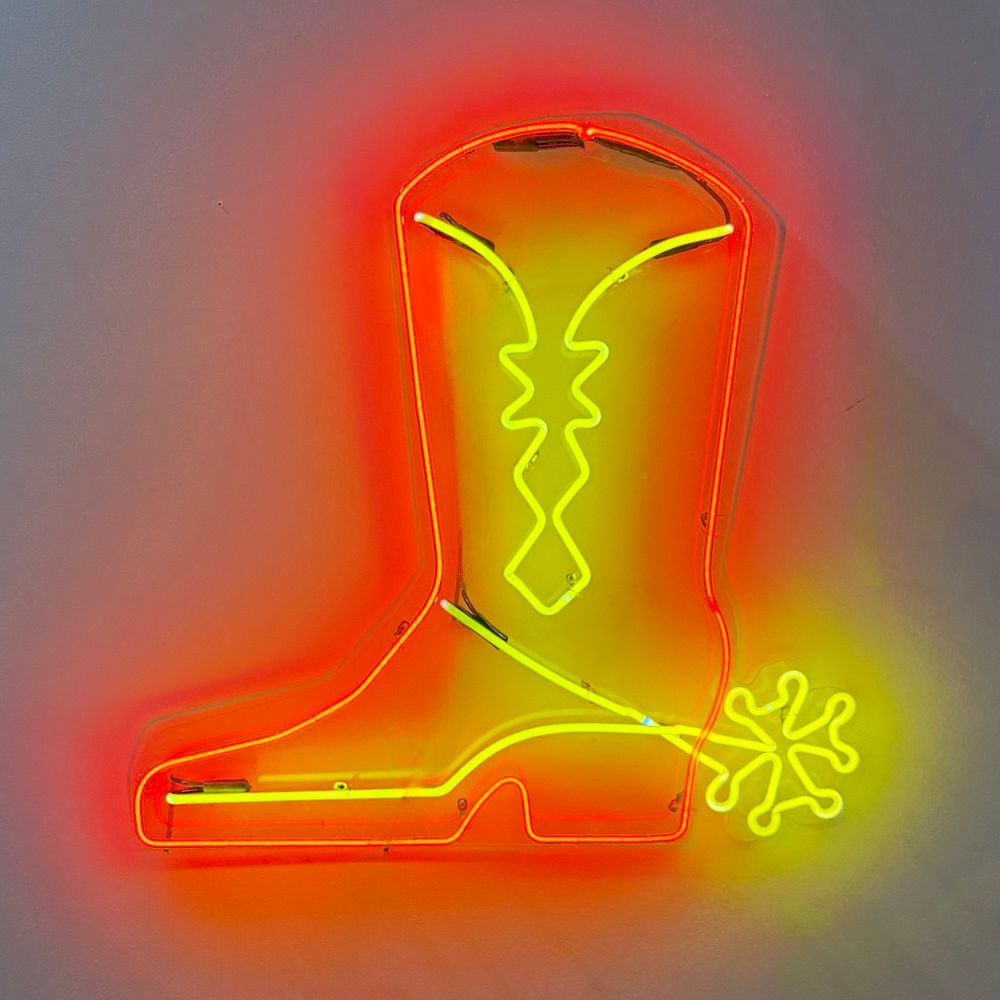 Cowboy Boot w/ Spur Vintage Inspired Neon Sign: Features a classic cowboy boot with a spur, outlined in bold yellow and red neon. Plug and play. Ready to hang and enjoy. Film/Television Appearance: Used in TV show - the Muppet Show Dimensions: 36&q
