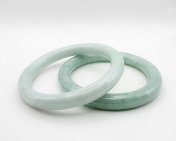 Pair Of Pale Green Jadeite Bangles