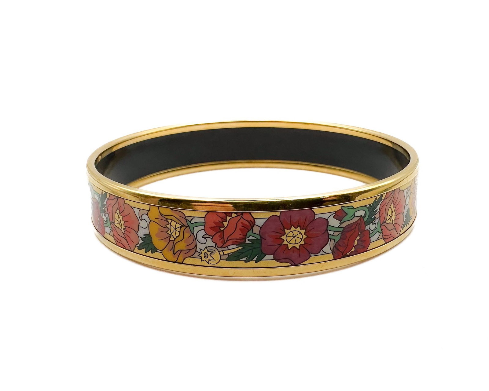 Frey Wille Bordered Bangle Miss, Poppies: Frey Wille Miss bangle featuring vibrant poppies design on gold-tone metal. Designer signed Frey Wille. Interior circumference approximately 8.19 inches, width 0.51 inches.