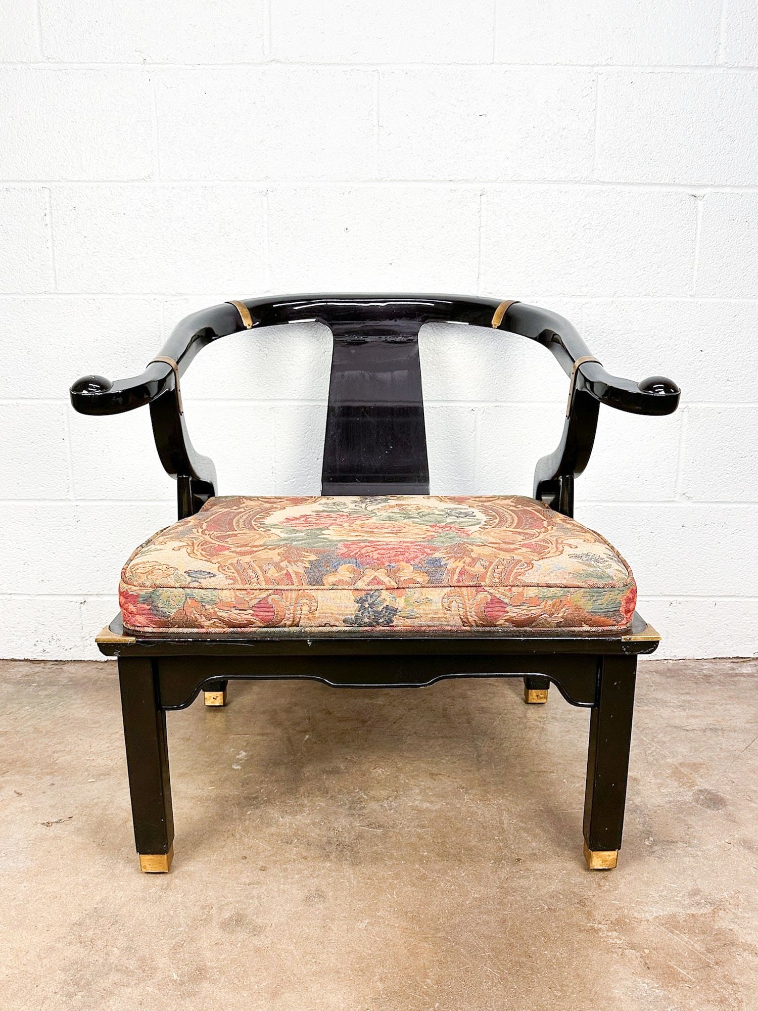 James Mont Style Late 20th Century Ming Style Horseshoe Chair: Brass hardware. Upholstered cushion.Dimensions: Approximately 29.5 in H x 31.25 in W x 28.5 in D. Seat is approximately 16 in H.