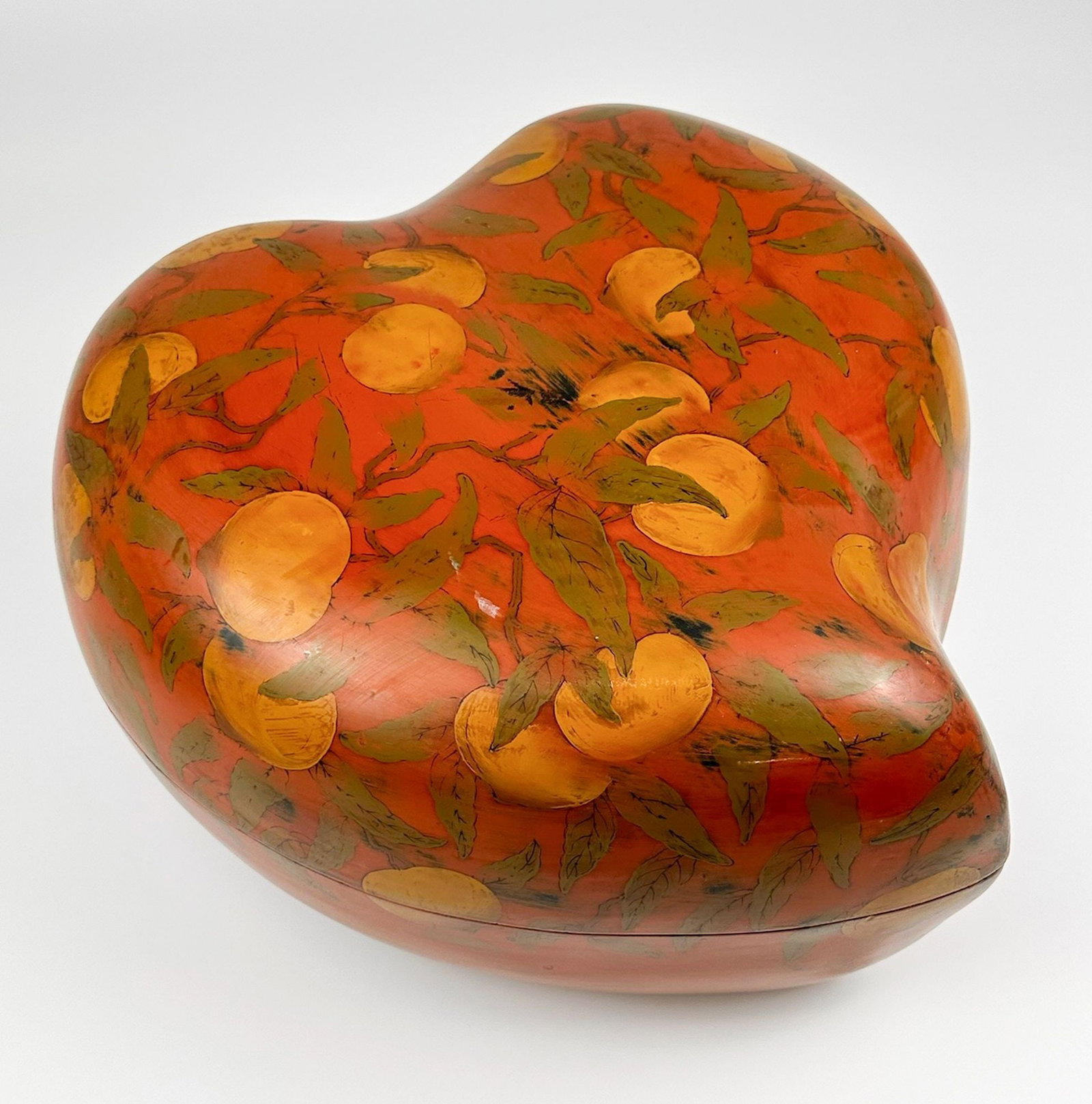 Lacquered Papier-Mache Heart Box with Peach Design: Large box features blooming peaches in earthy shades. Top removes to expose a spacious box. Approximately 8.25 in H x 15 in W x 15 in D. Weighs approximately 5 lbs 4 oz.