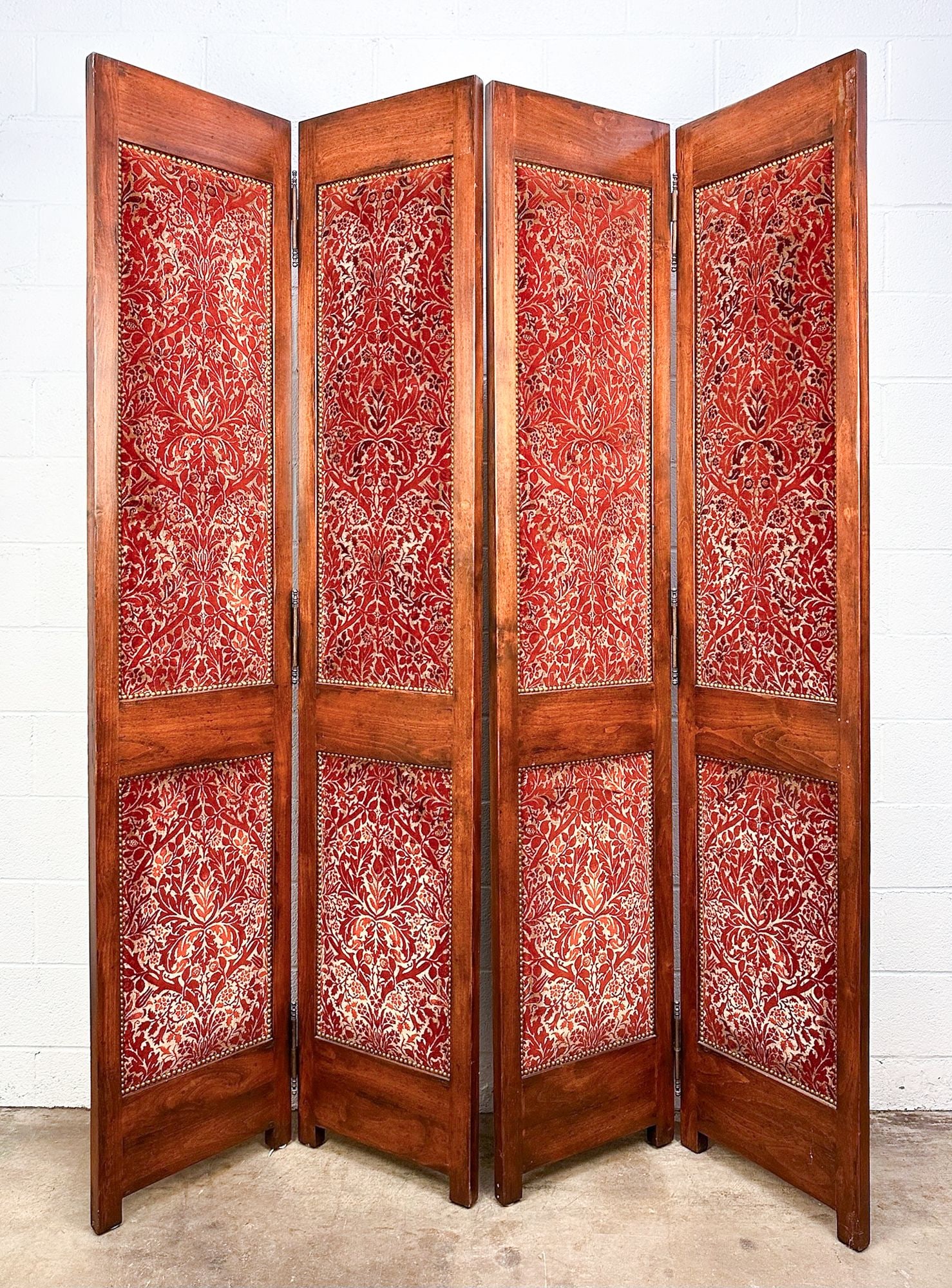 Pair Of Floral Red Velveteen Upholstered Room Dividers: Pair large room dividers w/ riveted upholstered red velveteen panels. Dimensions: Each room divider is approx. 90.5 in H x 36.5 in W x 1.5 in D.