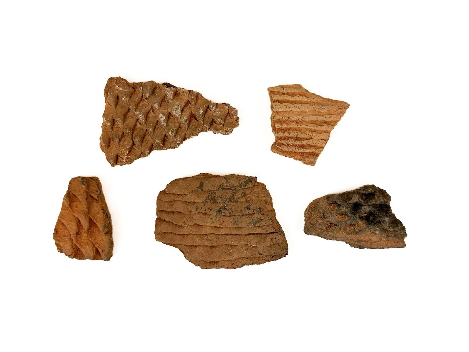 Lot Of Five Anasazi Prehistoric Pottery Shards: Shards are from Sand Gulch, Utah. Dimensions: Sizes range from approximately 1 in H x 1.25 in W to approximately 2.25 in H x 1.5 in W. Weighs approximately 1 lbs.