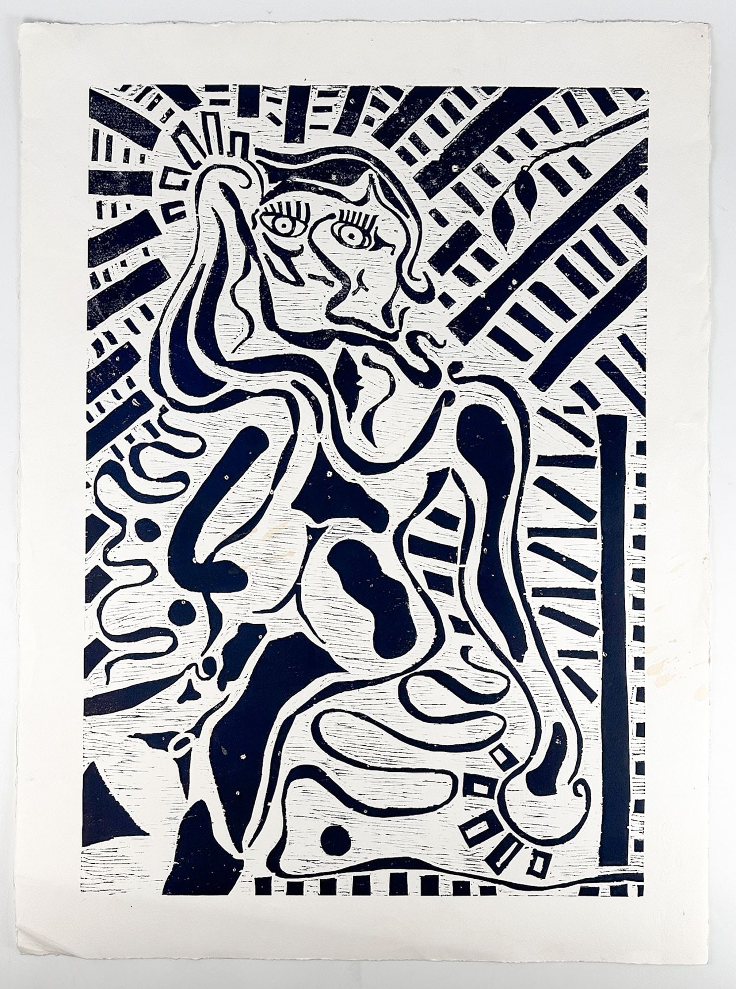 Artist Unknown, Abstract Nude Woodblock Relief Print: Woodblock relief print depicting abstract nude figure. Dark blue ink on paper. Unsigned. Dimensions: Print is approx. 30 in H x 22 in W. Weighs 1 lb.