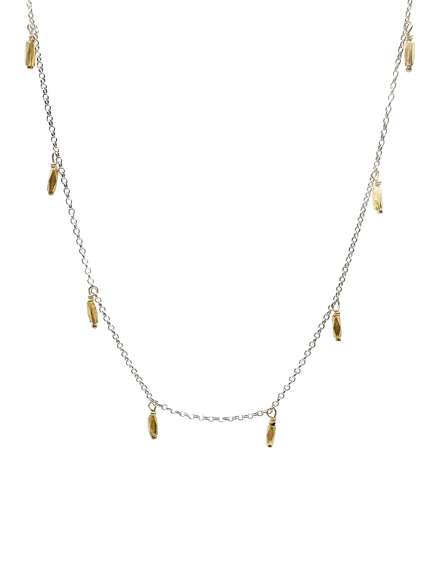 Sterling Silver & 18K Gold Tassel Drop Necklace: A delicate 17-inch necklace featuring a sterling silver chain with interspersed 18K gold tassel drops. Weighs 2.3 grams.