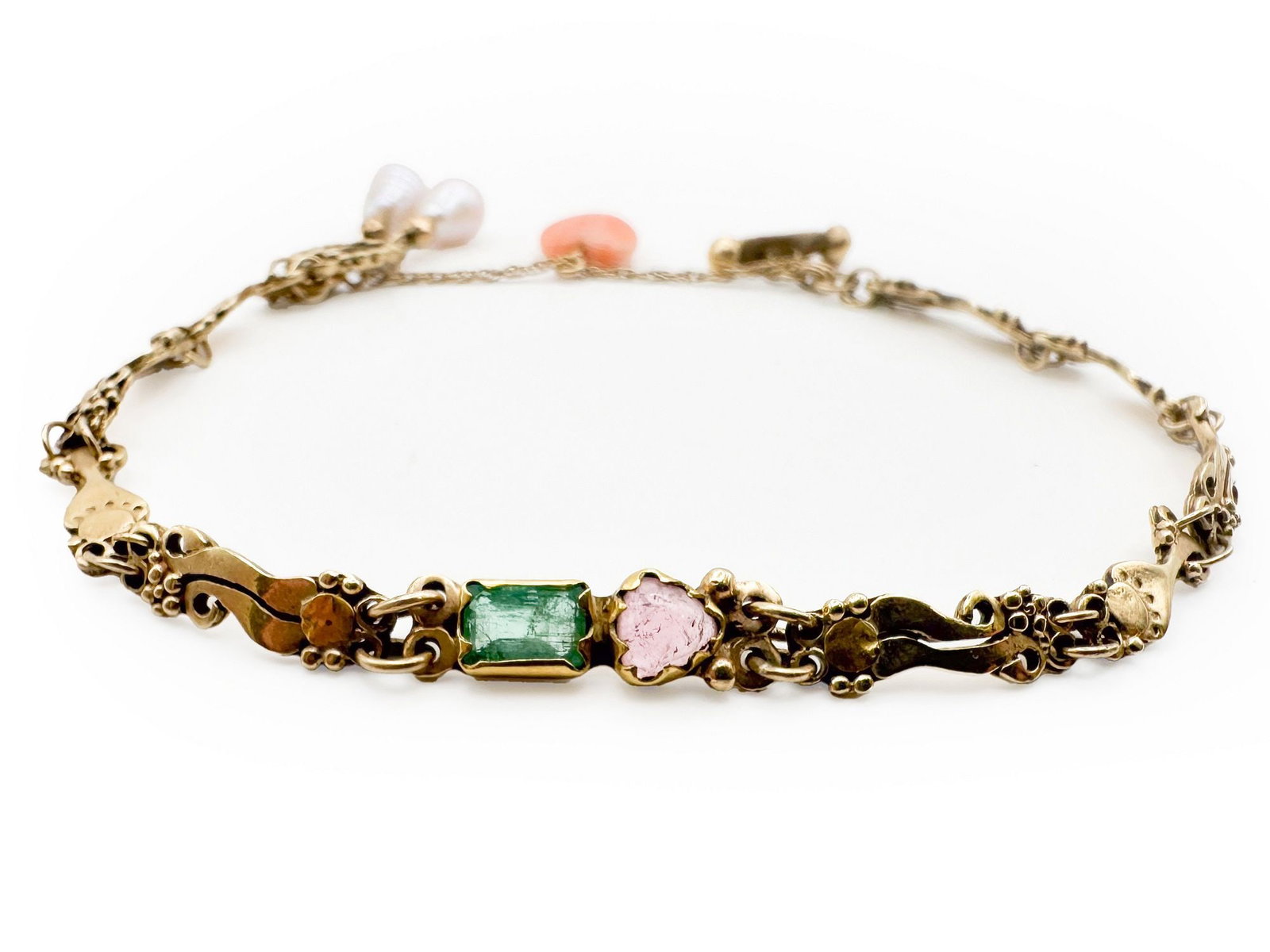 14K Victorian Revival Bracelet with T-Bar Clasp: 14K Victorian Revival bracelet featuring pearls, pink and green tourmaline, and angel skin coral. Marked MIX and 585. Measures 7 1/2 inches long and weighs 11.9 grams.