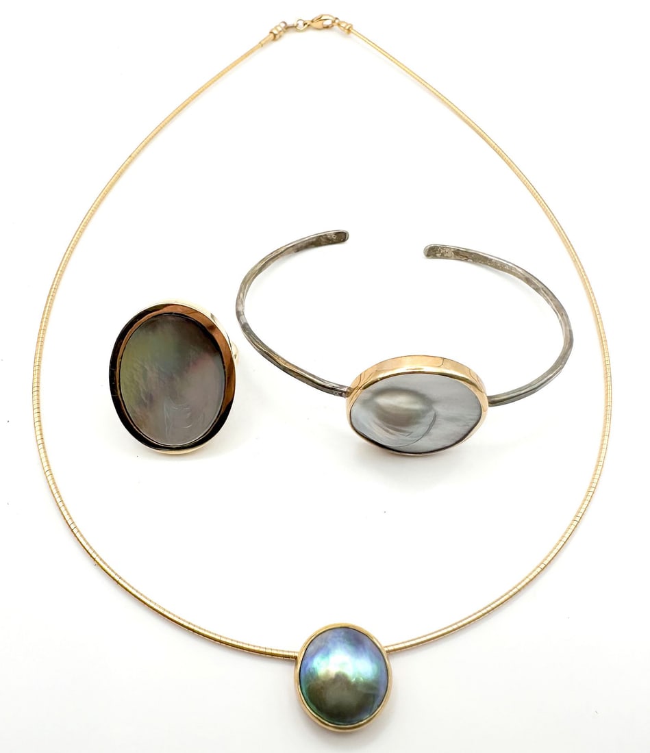Lot of 3: Mother of Pearl Ring, Bracelet, and Pearl Necklace: This lot includes a ring with an oval mother of pearl cabochon set in a 14K yellow gold mounting (size 8). Also featured is a bracelet with a mother of pearl inlay set in a gold bezel on a sterling si