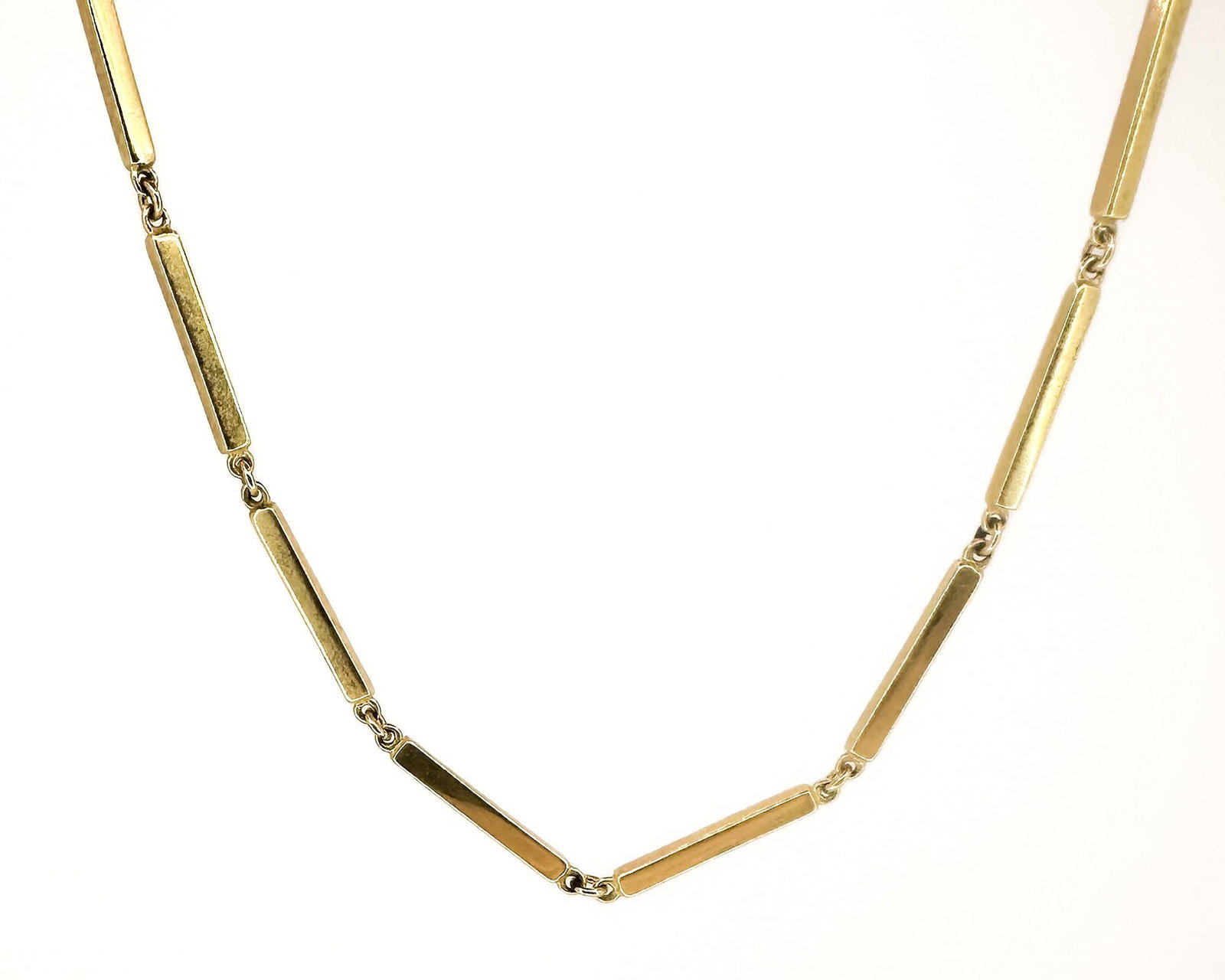 18K Yellow Gold Bar Link Necklace, 20.5 grams: 18K yellow gold necklace featuring bar-shaped links. Measures 16 inches in length and weighs 20.5 grams.
