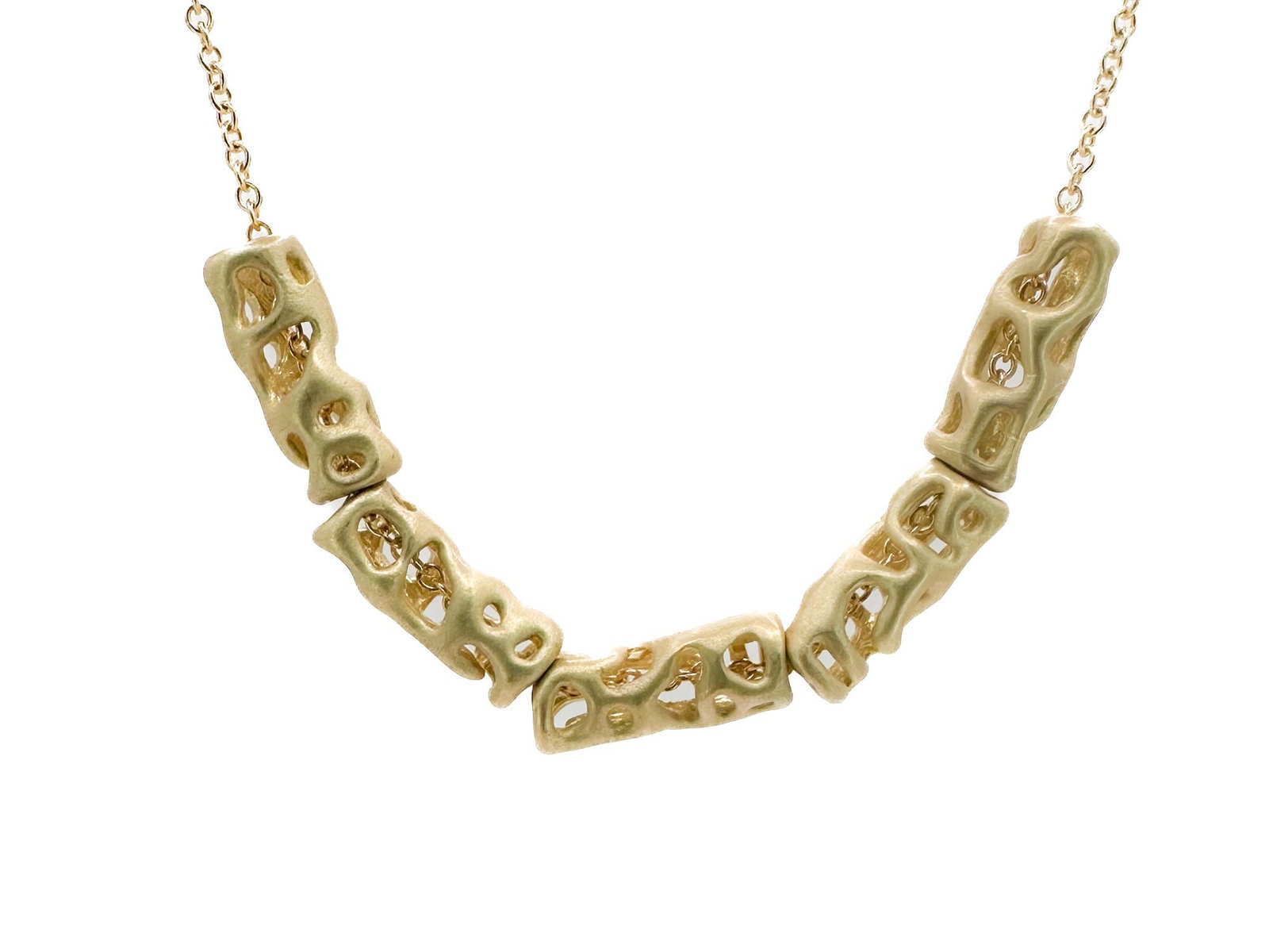 14K Yellow Gold Tube Bead Necklace, 16 in: 14K yellow gold necklace featuring unique tube-shaped beads. Measures 16 inches in length and weighs 5.6 grams.