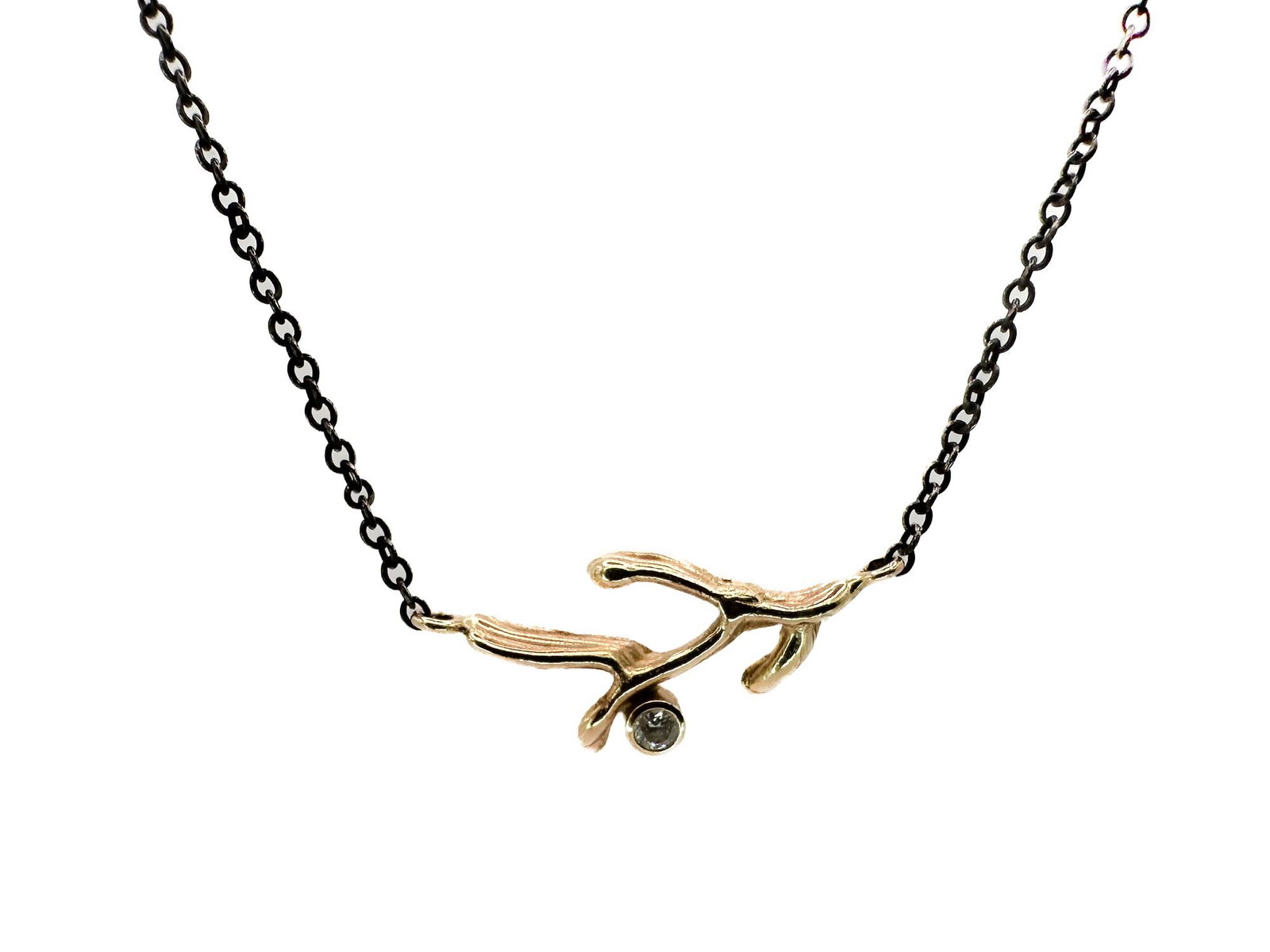 J 14K and Sterling Chain Branch with Diamond Necklace: 18-inch necklace featuring a sterling silver chain and 14K gold branch-like elements, one set with a small diamond. Total weight: 2.7 grams.