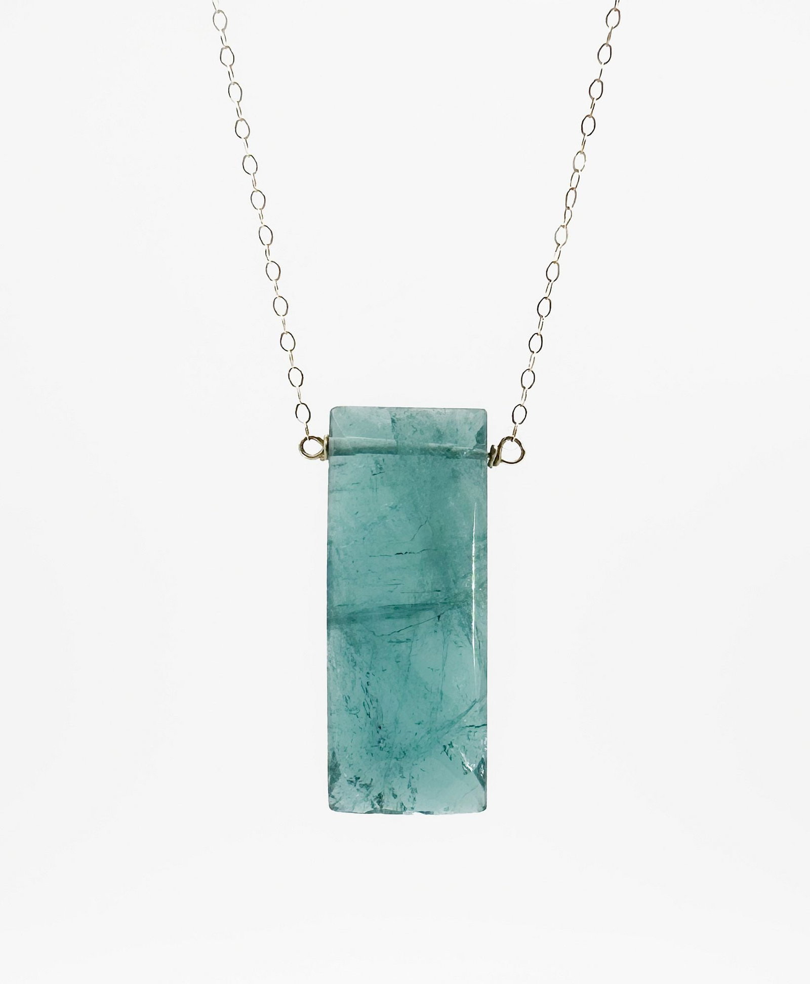 14K Gold & Tourmaline Pendant Necklace: Featuring a 14K gold chain and a tourmaline pendant. The chain is 16 inches long, and the pendant measures 1 1/8 inches. Total weight: 5.8 grams.