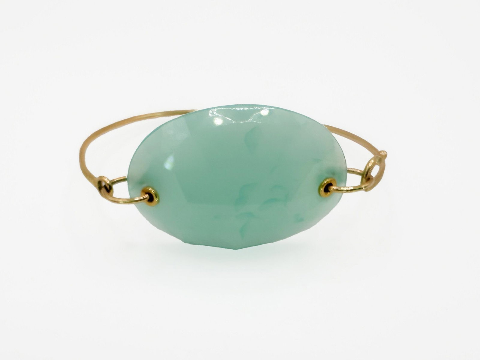 Jamie Joseph 14K Gold Light Blue Faceted Gemstone Bracelet: Jamie Joseph bracelet featuring a light blue faceted gemstone set in 14K gold. 6-inch opening. Weighs 13.8 grams.