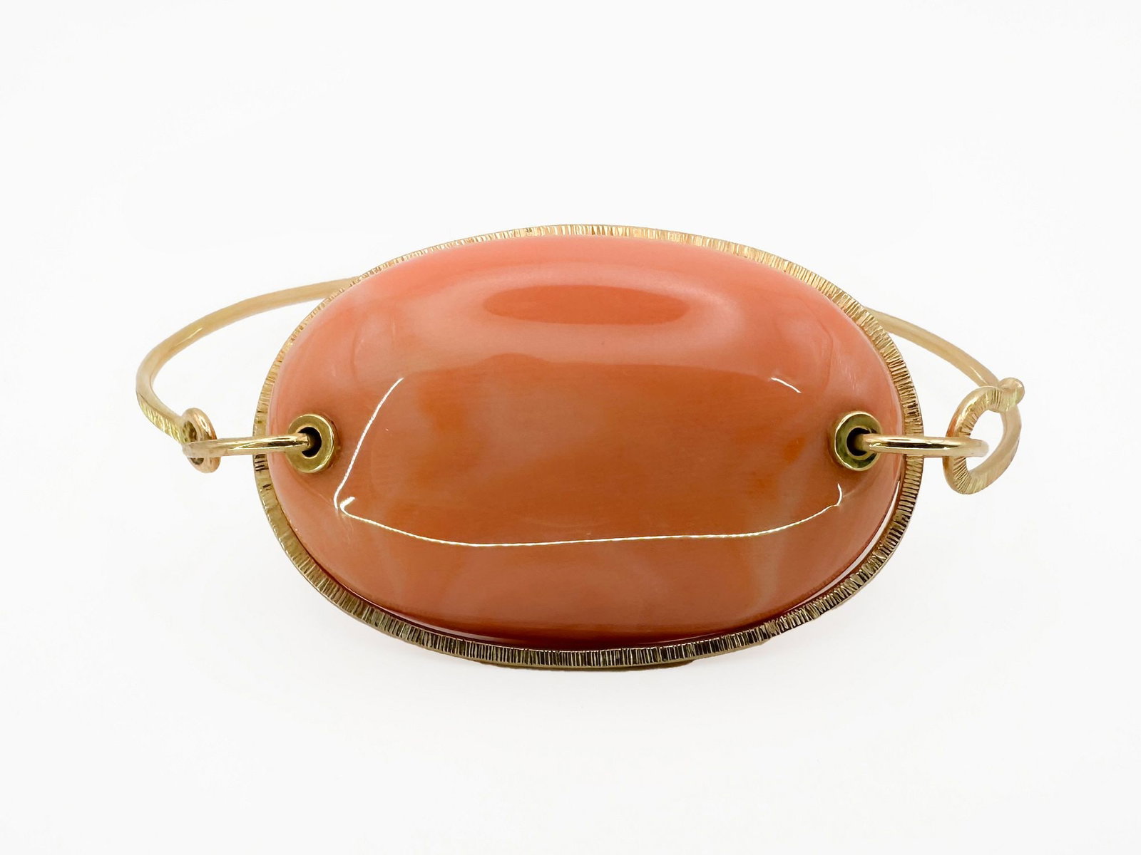 Jamie Joseph 14K Gold Angel Skin Coral Bracelet: Jamie Joseph 14K yellow gold bracelet featuring a large angel skin coral cabochon. 6 1/2 inches, 16.9 grams.