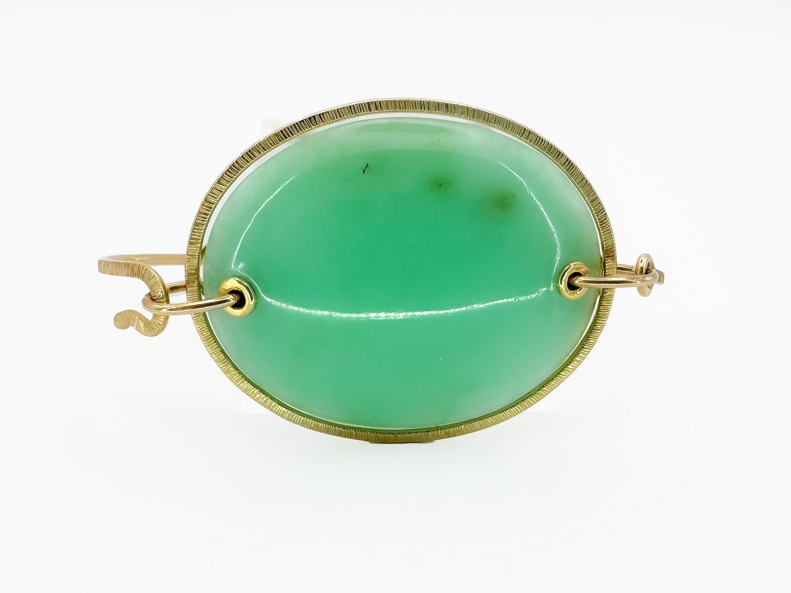 Jamie Joseph 14K Gold & Green Chrysoprase Bracelet: Jamie Joseph 14K yellow gold bracelet featuring a large, oval chrysoprase cabochon. Measures 6 1/2 inches and weighs 13.8 grams.