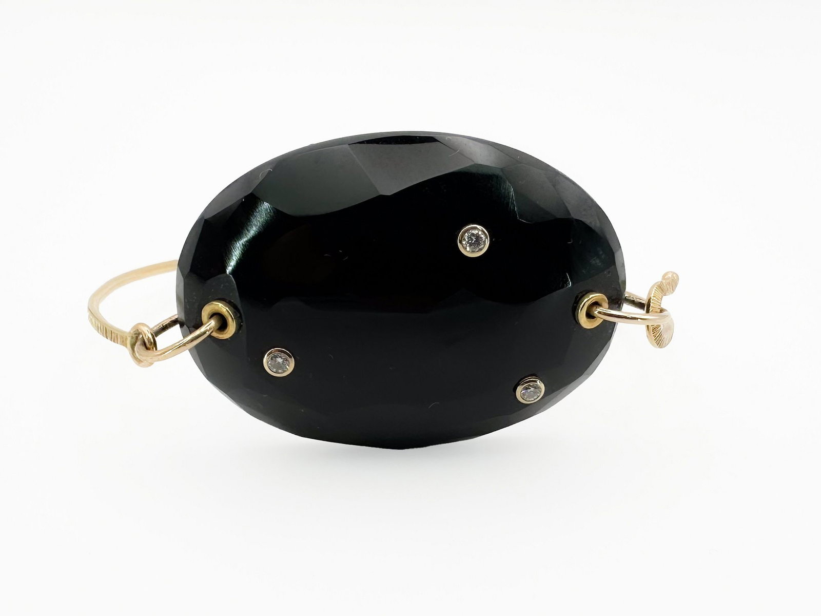 Jamie Joseph 14K Gold, Onyx & Diamond Bracelet: Jamie Joseph 14K yellow gold bracelet featuring a large faceted onyx stone accented with three small diamonds. 6 1/2 inches, 18.5 grams.