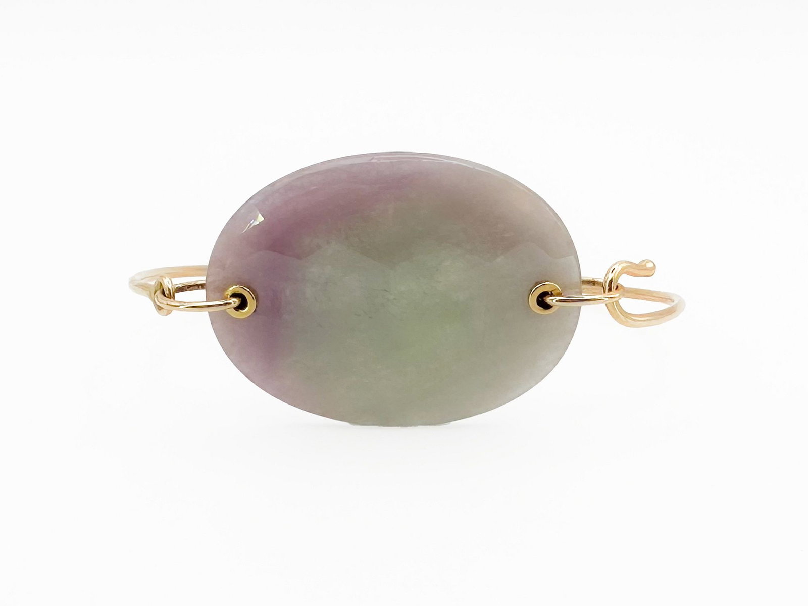 Jamie Joseph 14K Gold & Jadeite Bangle Bracelet: Jamie Joseph 14K yellow gold bangle bracelet featuring a faceted jadeite stone. Measures 6 1/2 inches, weighs 13.9 grams.