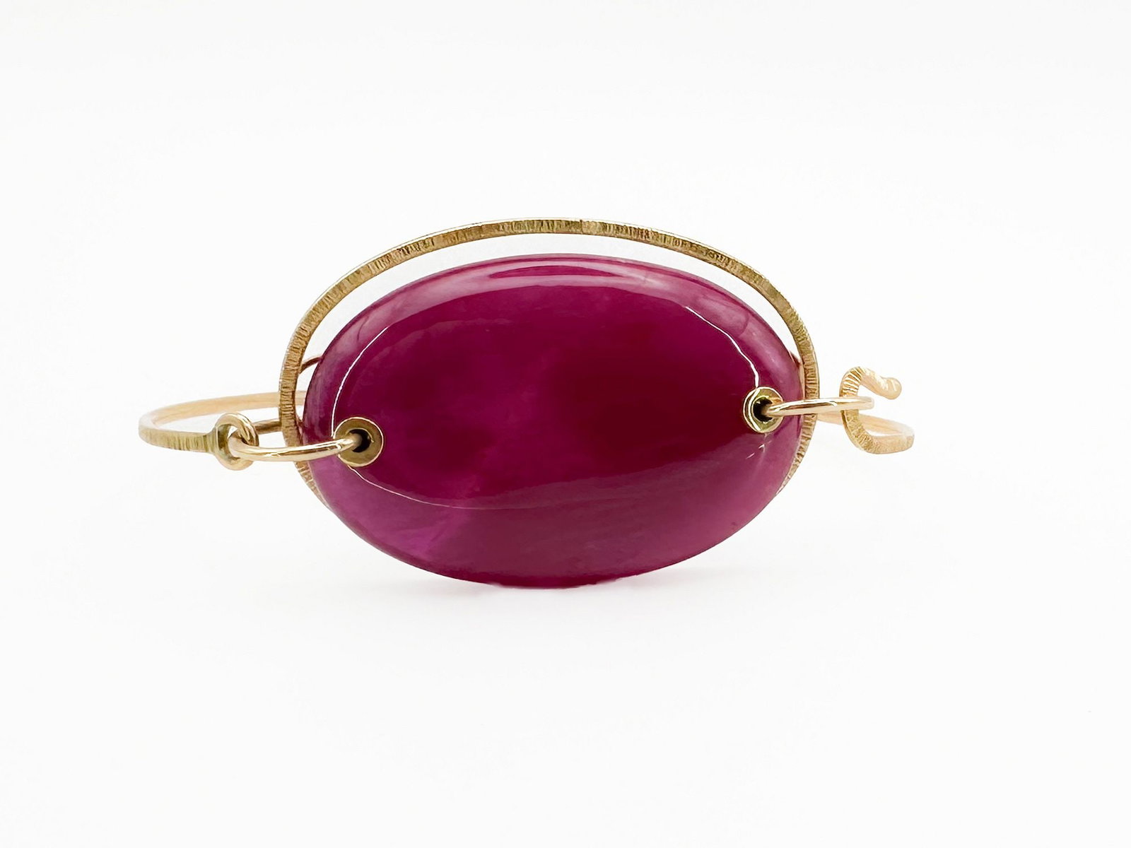 Jamie Joseph 14K Gold & Ruby Bangle Bracelet: Jamie Joseph 14K yellow gold bangle bracelet featuring a large oval ruby cabochon. 6 inches, 18.7 grams.