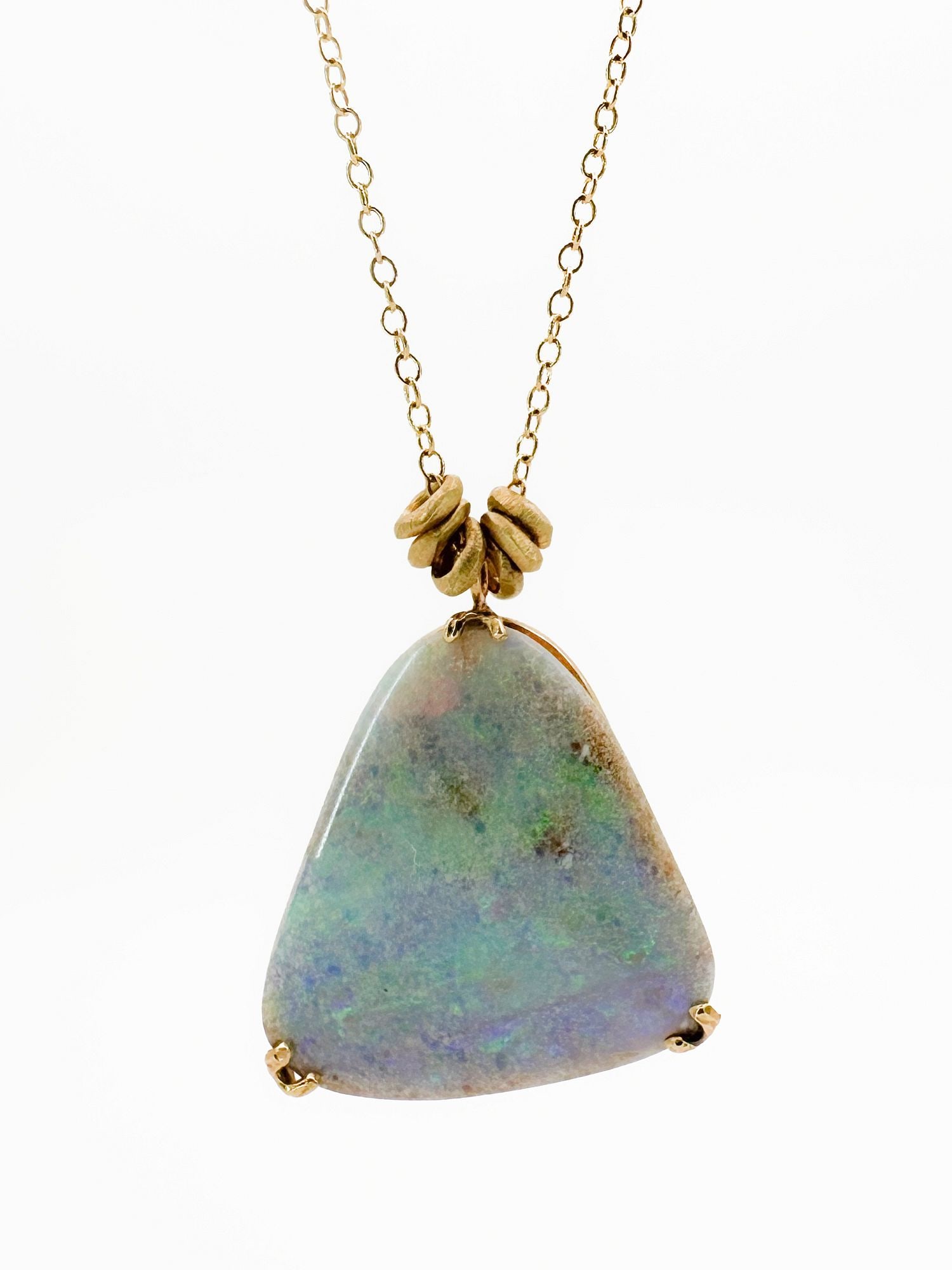 Jamie Joseph 14K Gold Boulder Opal Pendant Necklace: Jamie Joseph 14K yellow gold necklace featuring a boulder opal pendant. The 19-inch chain is accented with six small gold hoops. Pendant measures 1 inch long. Total weight: 6.2 grams.