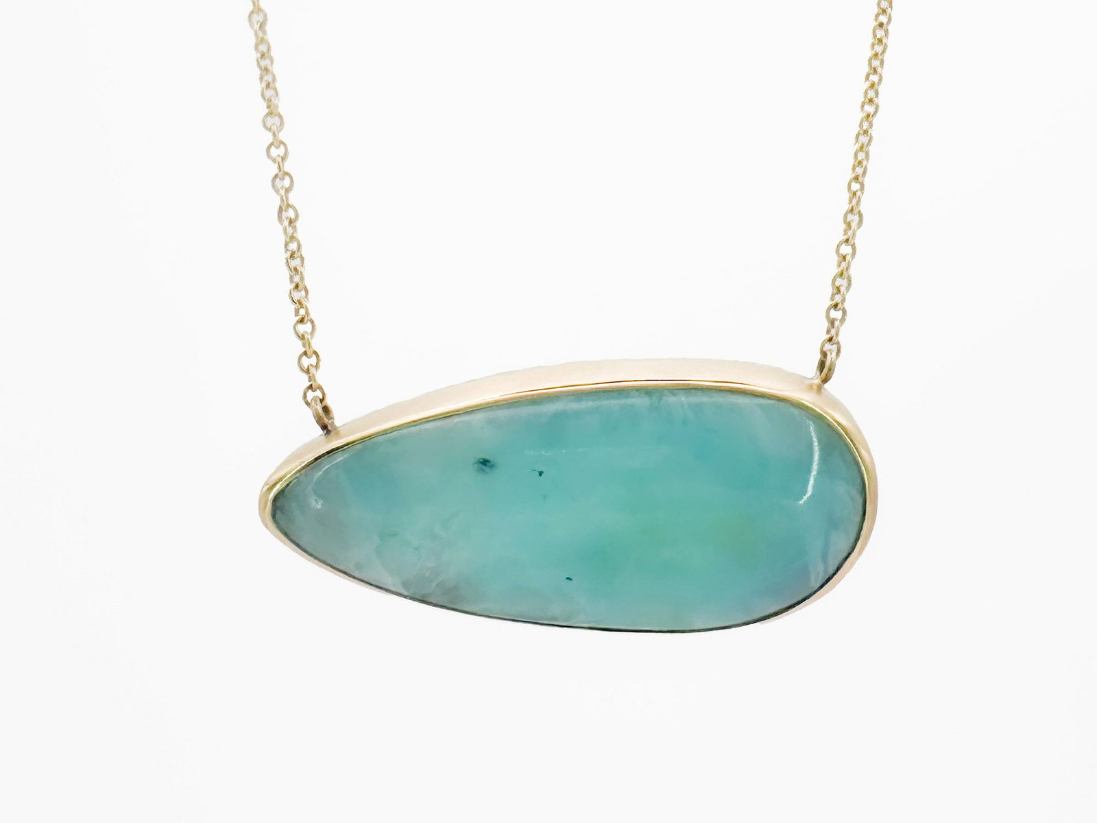 Jamie Joseph 14K Gold Turquoise Pendant Necklace: Jamie Joseph necklace featuring a blue turquoise pendant with a 14K gold bezel and sterling silver back. The chain measures 17 inches and the piece weighs 6.5 grams.