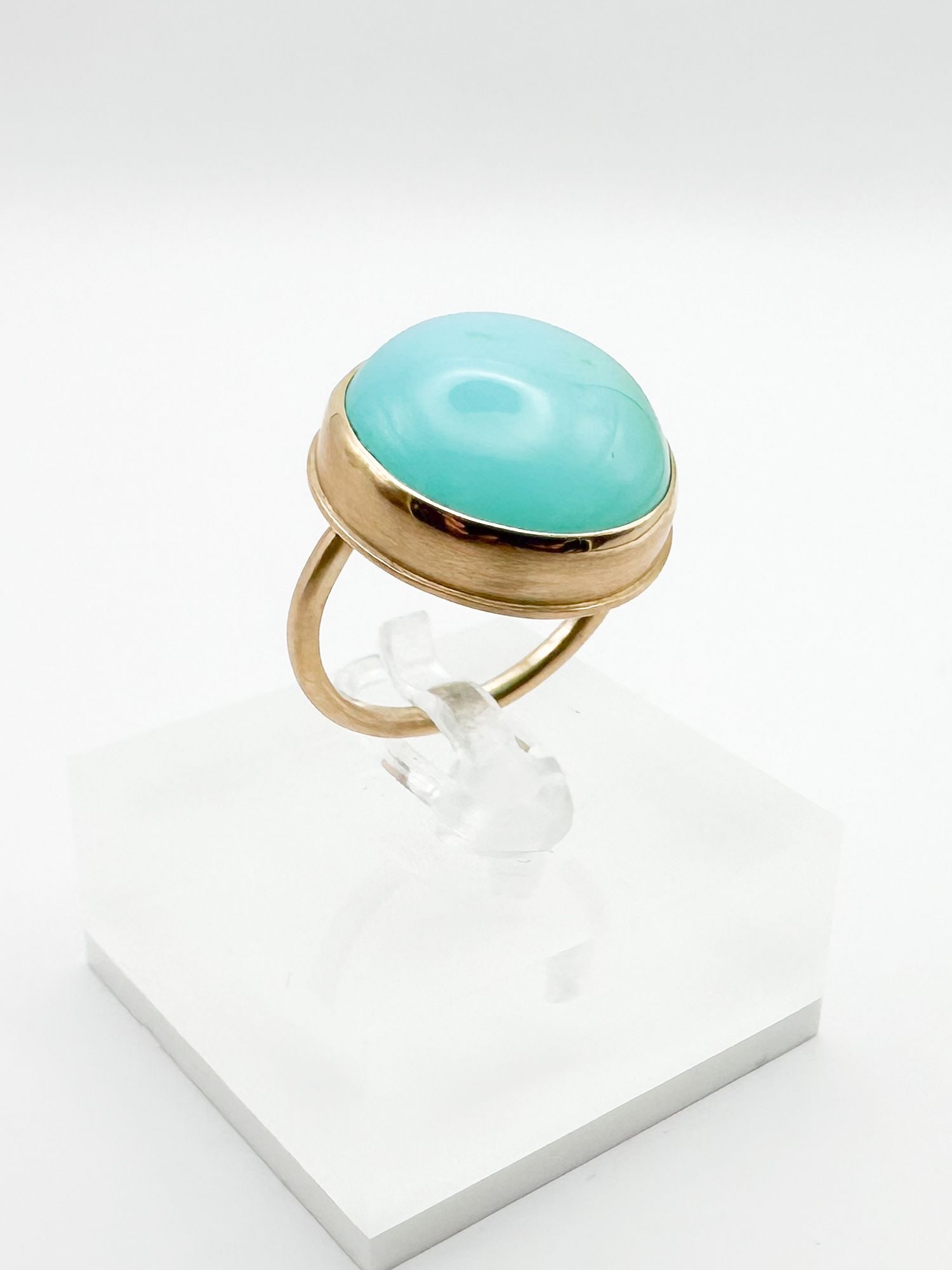 Jamie Joseph 14K Gold & Sea Blue Chalcedony Ring: Jamie Joseph ring featuring a sea blue chalcedony stone set in a 14K gold bezel and band. Stone measures approximately 3/4 inch in diameter. Ring size 6 3/4. Weighs 8.3 grams. Hallmarked.