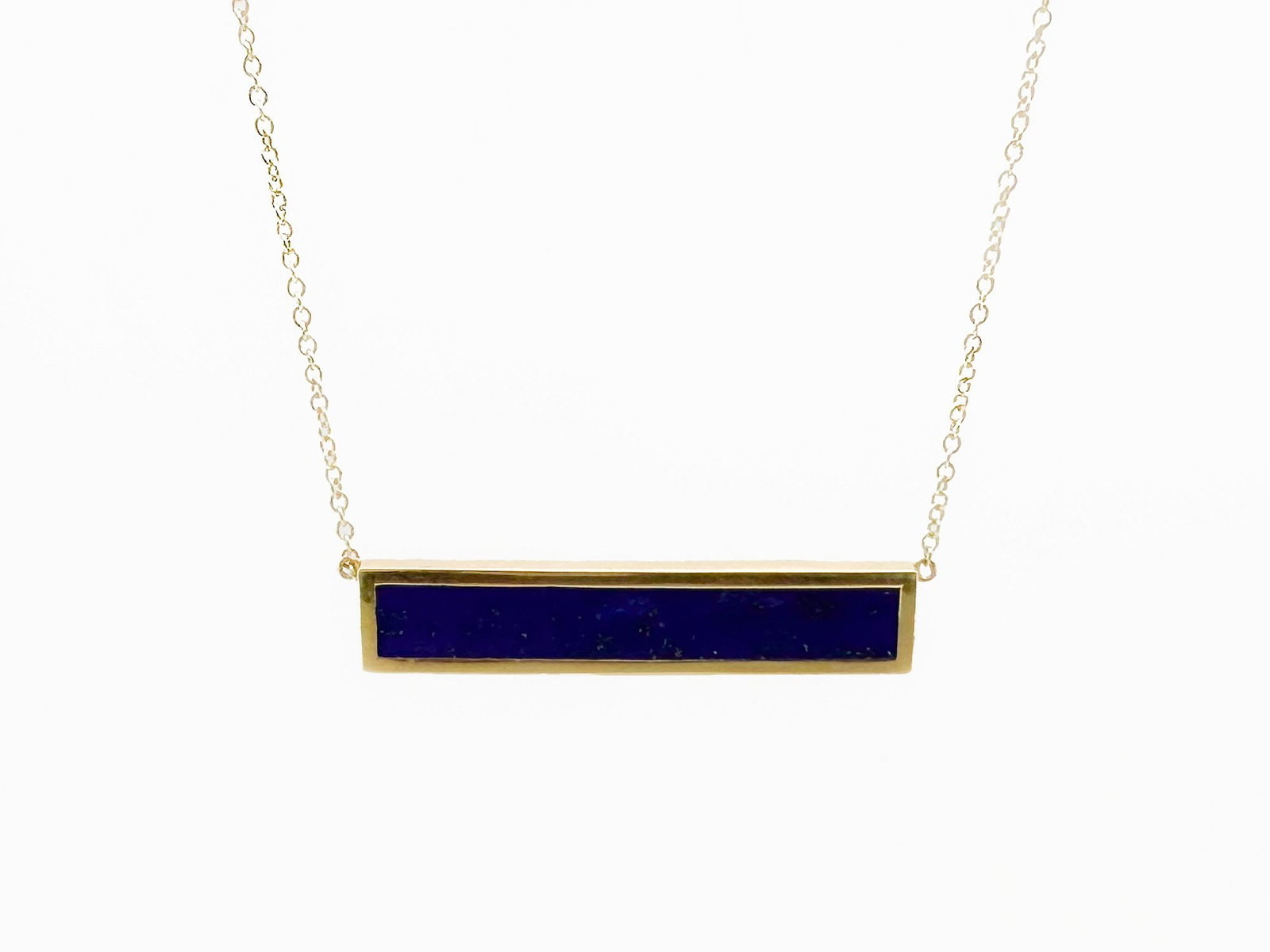 JEM 18K Gold & Lapis Lazuli Bar Necklace: An 18K gold necklace featuring a lapis lazuli bar pendant. The necklace is 18 inches long, with the bar measuring 1 1/8 inches. Total weight: 4.4 grams. Marked JEM 8K.
