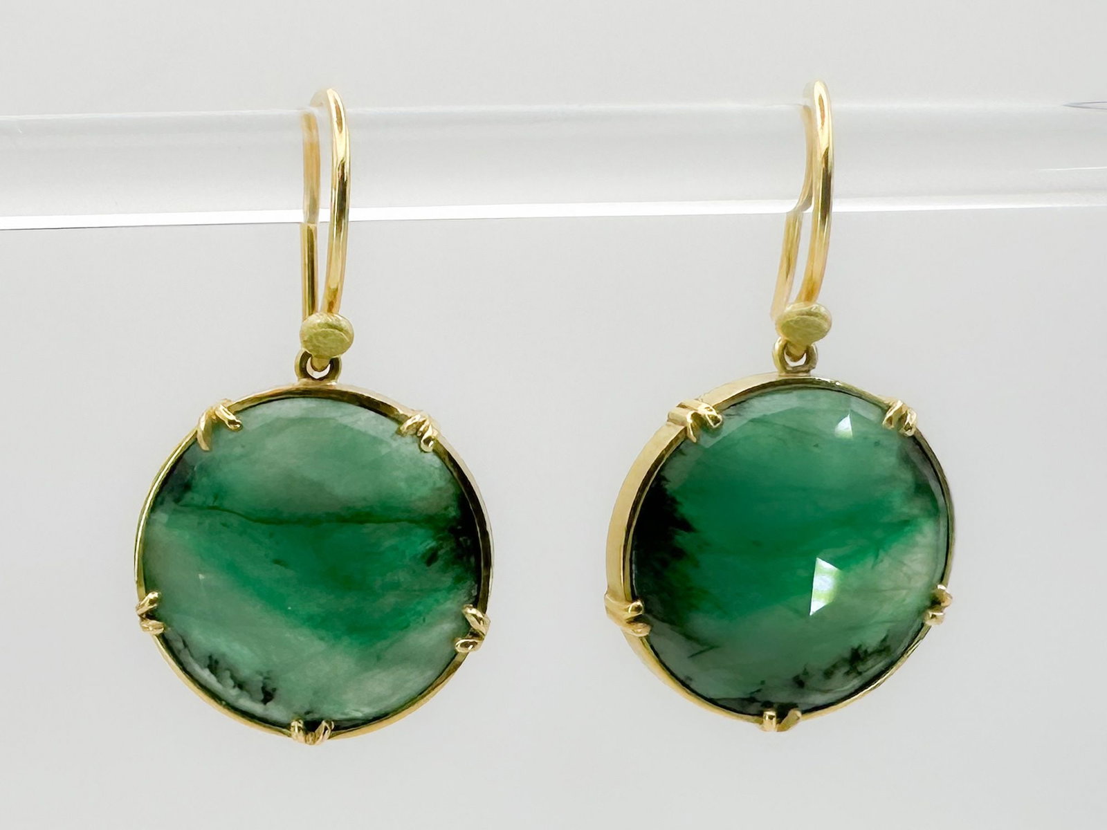 Brooke Gregson 18K Gold Green Tourmaline Earrings: Pair of Brooke Gregson earrings featuring faceted green tourmaline stones set in 18K gold. Each earring is 5/8 inch in diameter and weighs 5.5 grams.