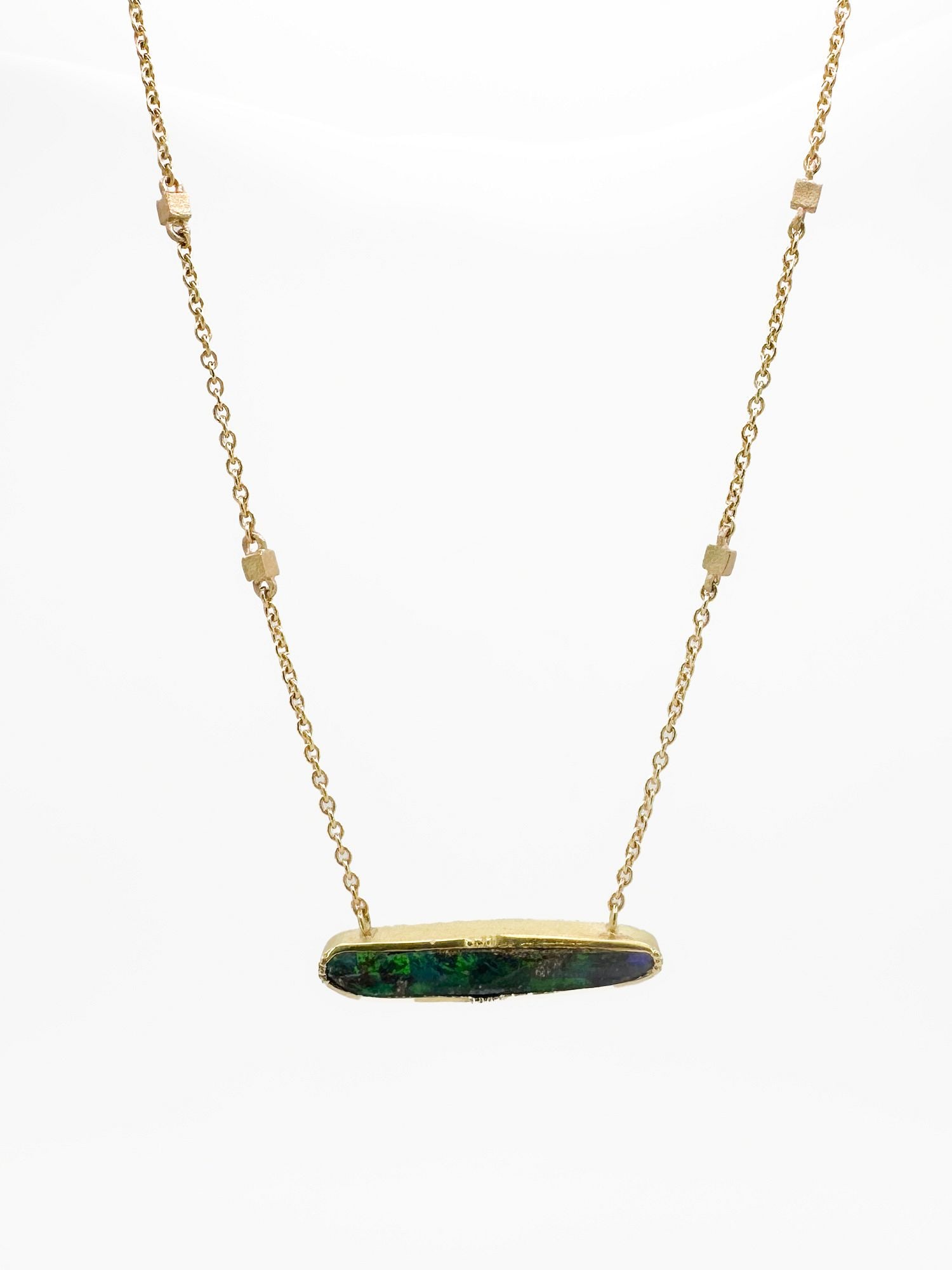 Brooke Gregson 18K Gold Boulder Opal Pendant Necklace: Brooke Gregson 18K yellow gold necklace featuring a boulder opal pendant. Chain is 17 inches long, pendant is 1 1/8 inches wide, and the piece weighs 6.9 grams.
