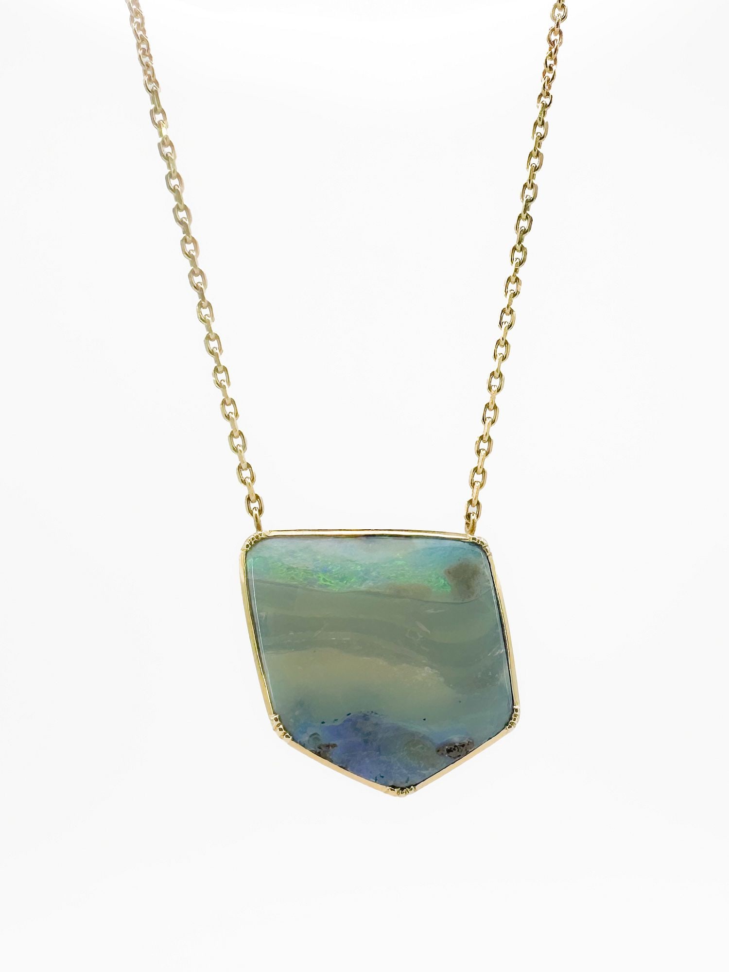Brooke Gregson 18K Gold Boulder Opal Pendant Necklace: Brooke Gregson necklace featuring an 18K gold chain and a boulder opal pendant. Chain is 18 inches long, pendant is 1 inch long. Weighs 14.4 grams.