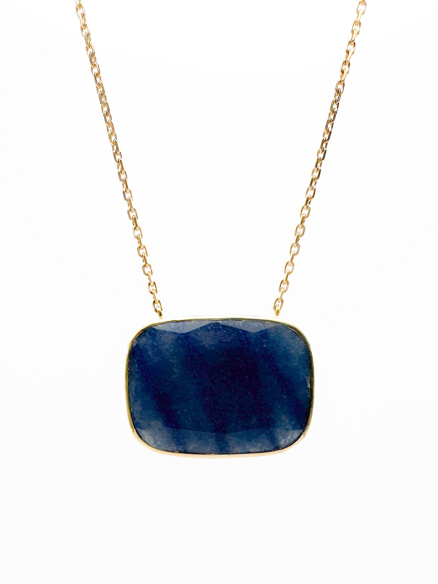 Brooke Gregson 18K Gold & Sapphire Pendant Necklace: Brooke Gregson 18K yellow gold necklace featuring a sapphire pendant. 16 1/4 inches long. Pendant 7/8 inch wide. 6.3 grams.