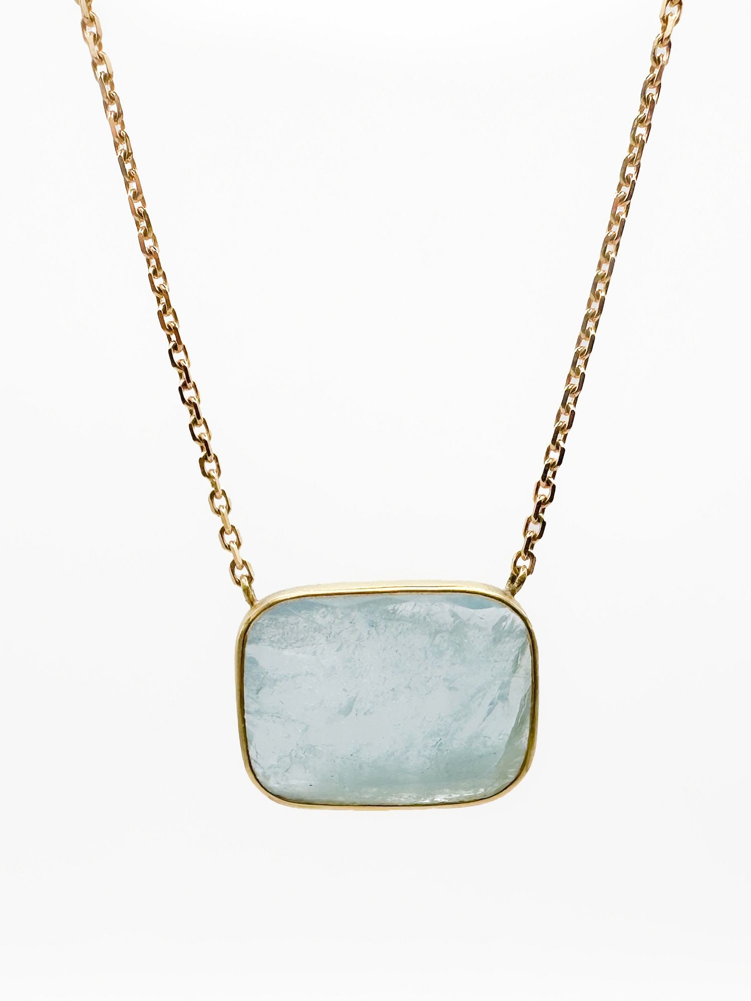 Brooke Gregson 18K Gold Aquamarine Pendant Necklace: Brooke Gregson 18K yellow gold necklace featuring a rectangular aquamarine pendant. 16 1/4 inches long. Pendant 7/8 inch wide. 7 grams.