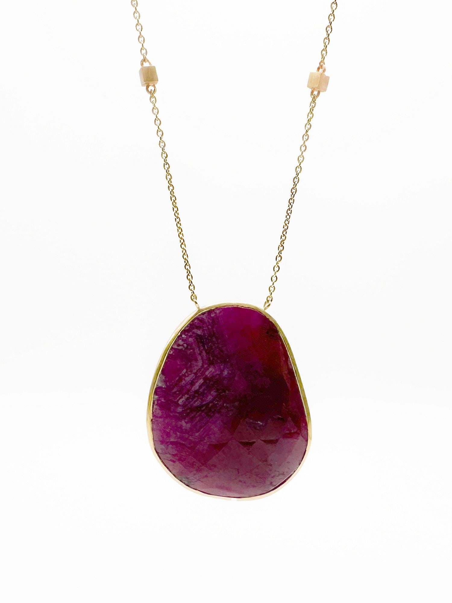 Brooke Gregson 18K Gold & Sapphire Pendant Necklace: Brooke Gregson 18K yellow gold necklace featuring a large sapphire pendant. The chain is accented with 12 cube beads. Chain length: 18 inches. Pendant length: 1 1/2 inches. Total weight: 22.4 grams.