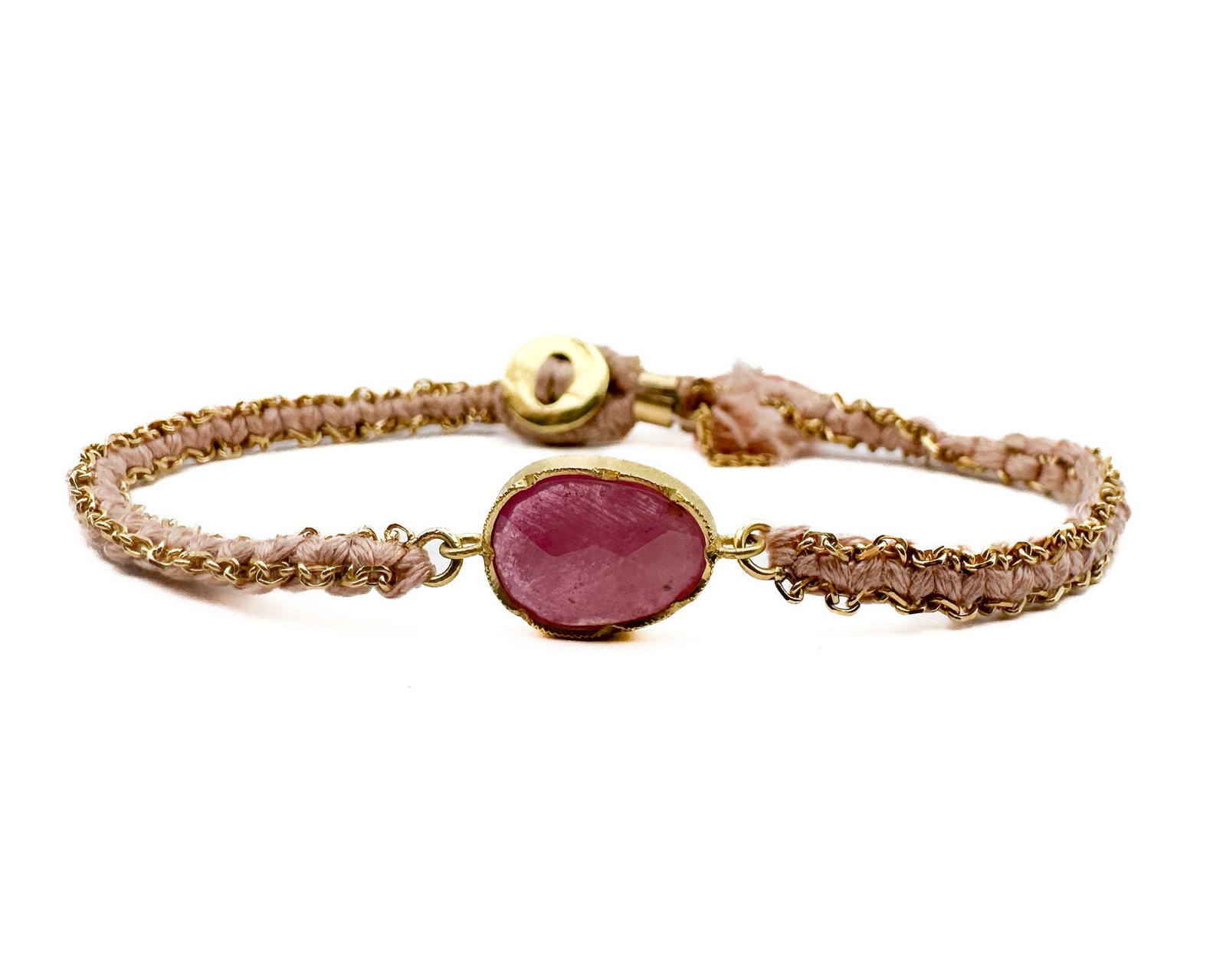 Brooke Gregson 18K Gold Pink Sapphire Gold & Silk Cord Bracelet: Brooke Gregson bracelet featuring 18K gold setting with pink sapphire on gold and silk cord. Marked 18K. Designer signed. Measures 6.5 inches in length. Total weight: 5.3 grams.