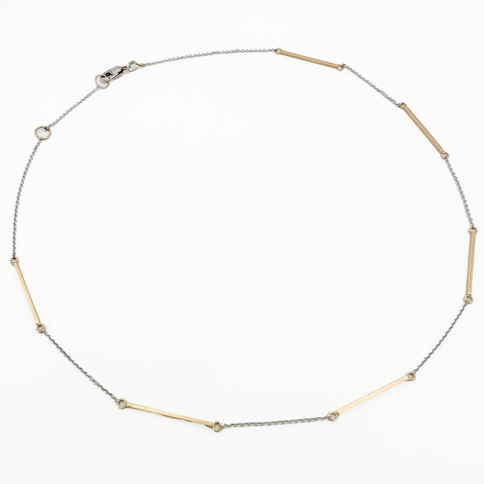 14K Yellow Gold Bar & White Gold Chain Necklace, Italy: 14K yellow gold bar and white gold chain necklace. Marked Italy. Measures 16 inches long and weighs 2.7 grams.