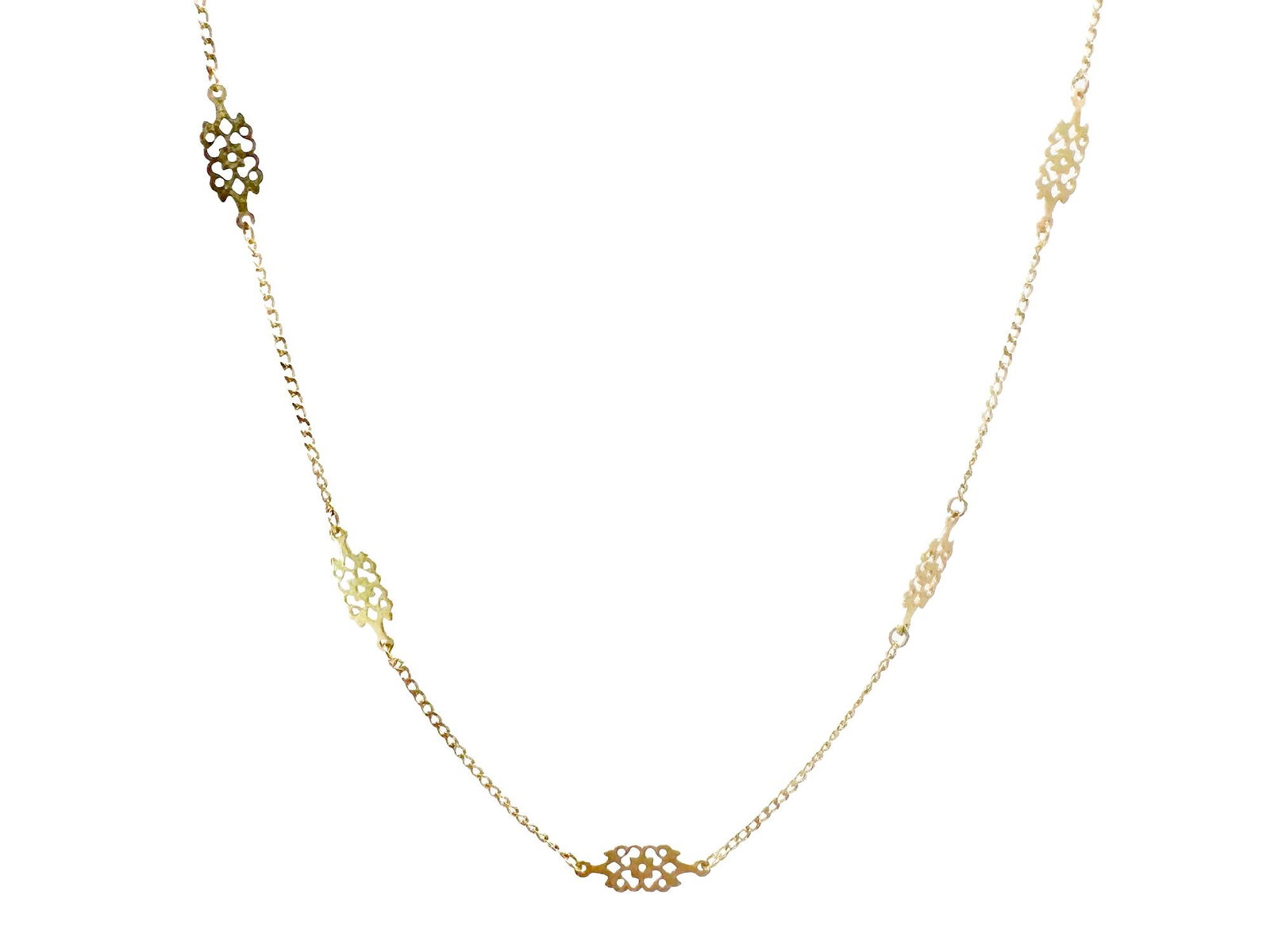 Speidel 14K Yellow Gold Floral Station Necklace: A Speidel 14K yellow gold necklace featuring a delicate chain with floral lace station details. Measures 17 inches in length and weighs 1.8 grams.