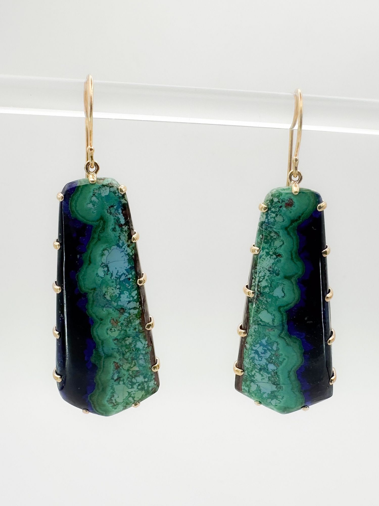 14K Gold and Azurite Drop Earrings: Pair of 14K yellow gold drop earrings. Each earring measures 1 1/2 inches long and weighs 7.8 grams.