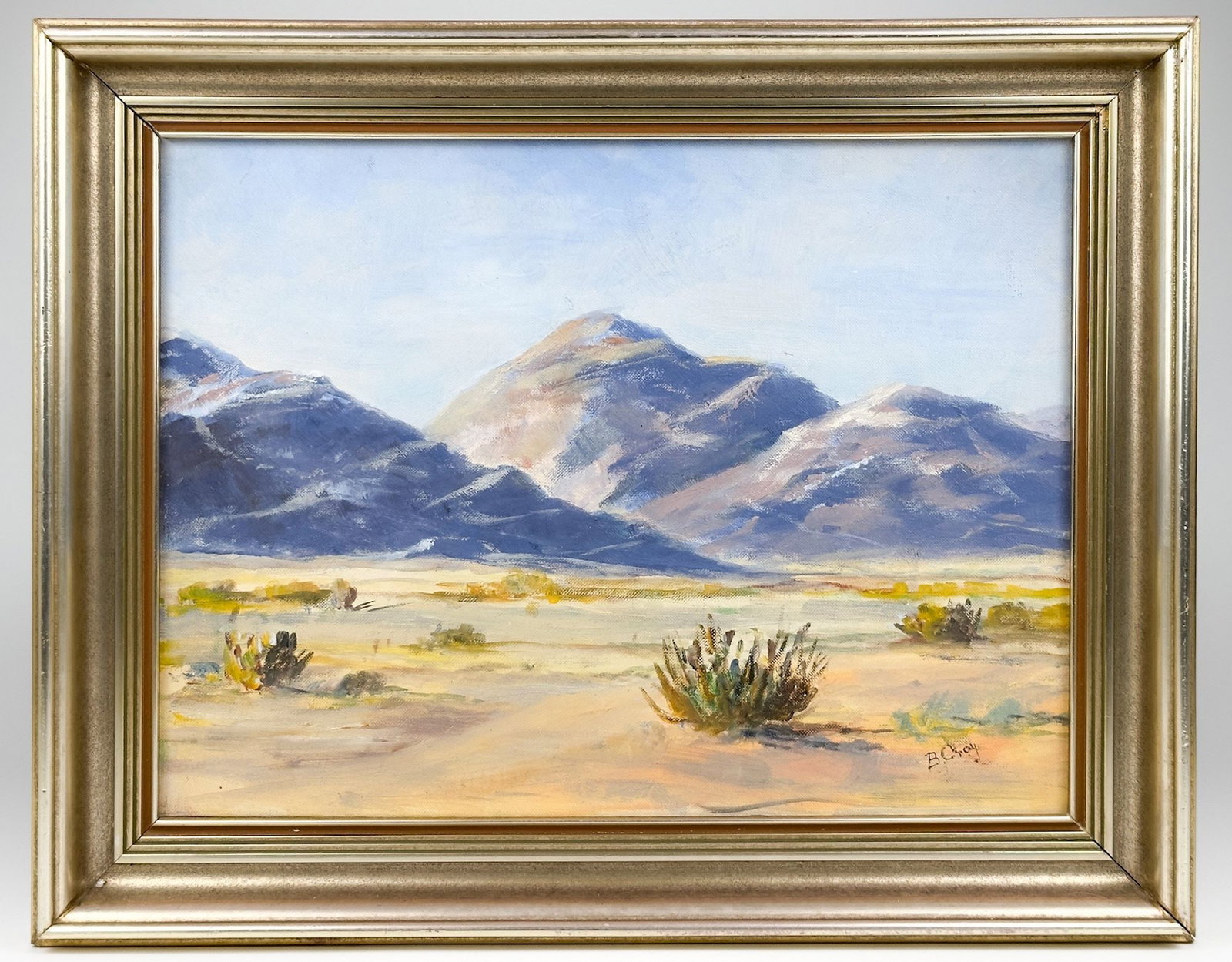B. Gray (20th Century) Oil on Canvas Board, Californian Desert: Titled Californian Desert. Signed in the lower right corner and on the back side. Depicts a desert landscape. Framed. Visible image is approximately 11.5 in H x 15.5 in W. Frame is approximately 15.25